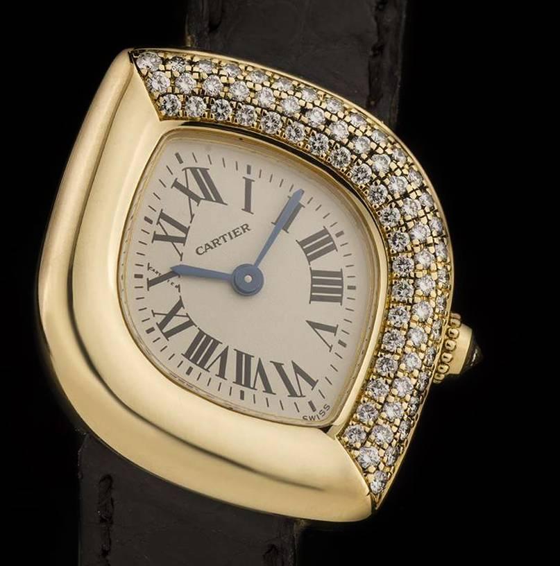 An 18k Yellow Gold Navette Montre Ladies Wristwatch, silver dial with roman numerals and a secret signature at 