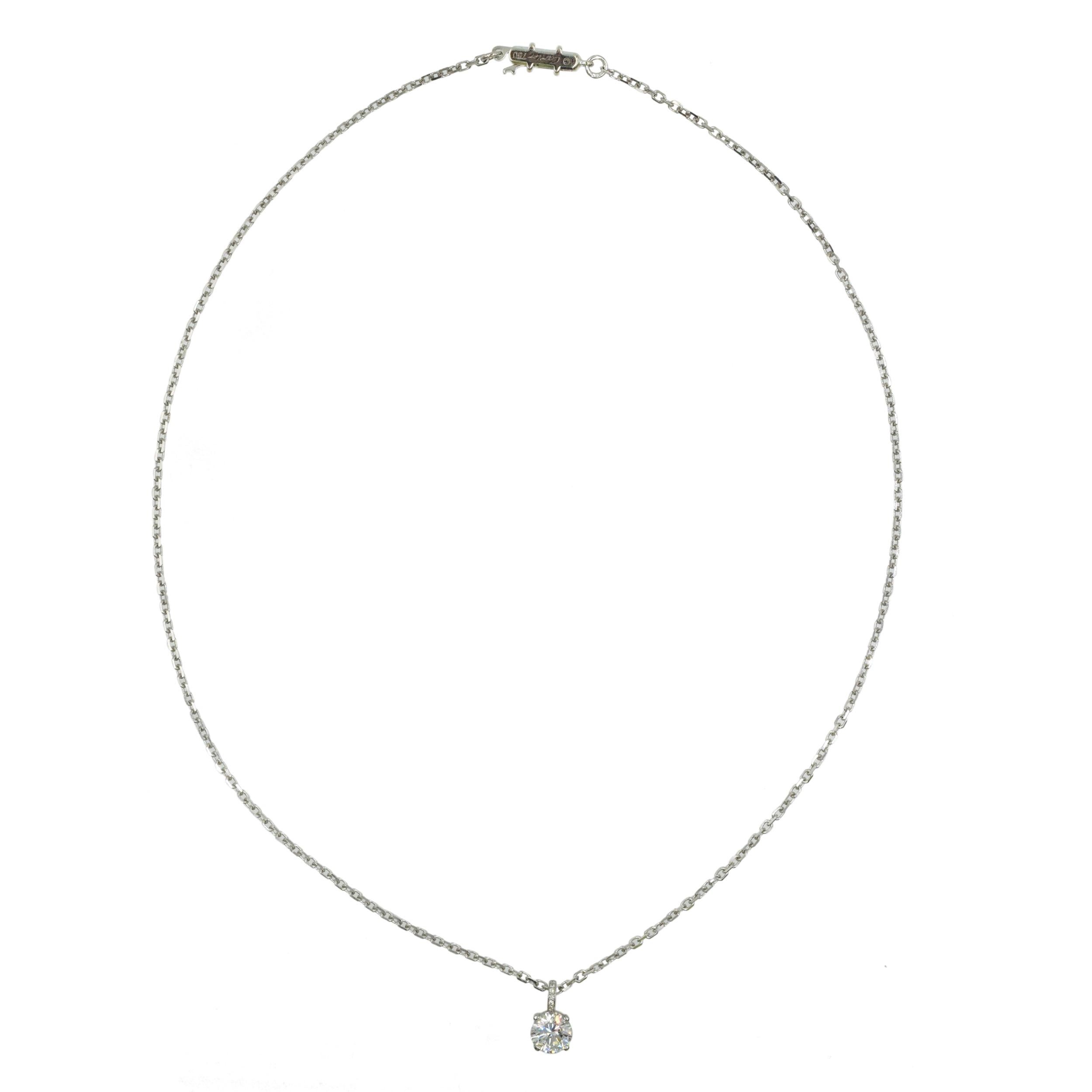 Cartier 18k White Gold & Platinum Diamond Solitaire Pendant Necklace. This pendant necklace
has a center of 1.01 carat round brilliant center diamond, Color: D, Clarity: IF, GIA#2193906884.
Signed Cartier, Serial No. xxxxxxxxPendant) and xxxxxxx