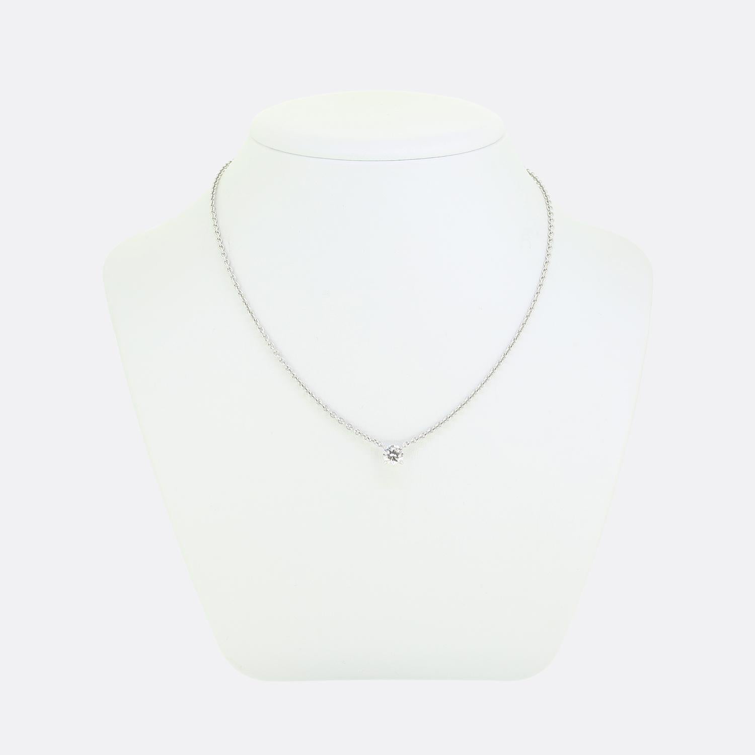 Here we have a fabulous 18ct white gold necklace from the world renowned luxury jewellery house of Cartier. The pendant is a simple solitaire style and features a 0.90 carat round brilliant cut diamond, set in a four claw mount. As you would expect