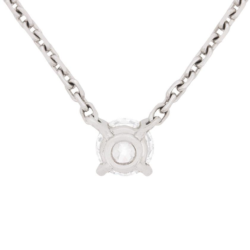 A classic design from Cartier, this necklace features a single claw set diamond weighing 0.51 carat. It has been graded by GIA, the world renowned company, as a H in colour and VVS1 in clarity. It shines within the platinum collet, which is