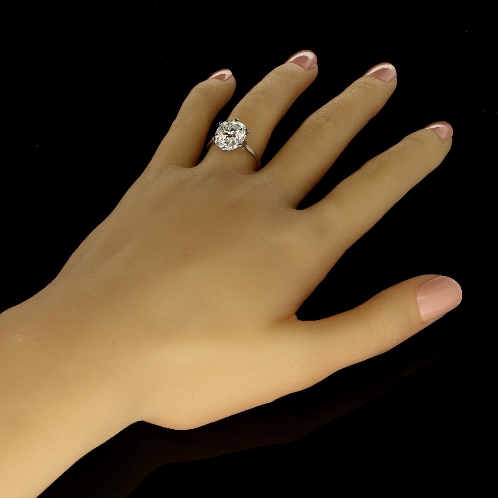 Women's or Men's Cartier Diamond Solitaire Ring with a 6.06 Carat Old Mine Brilliant Cut Diamonds