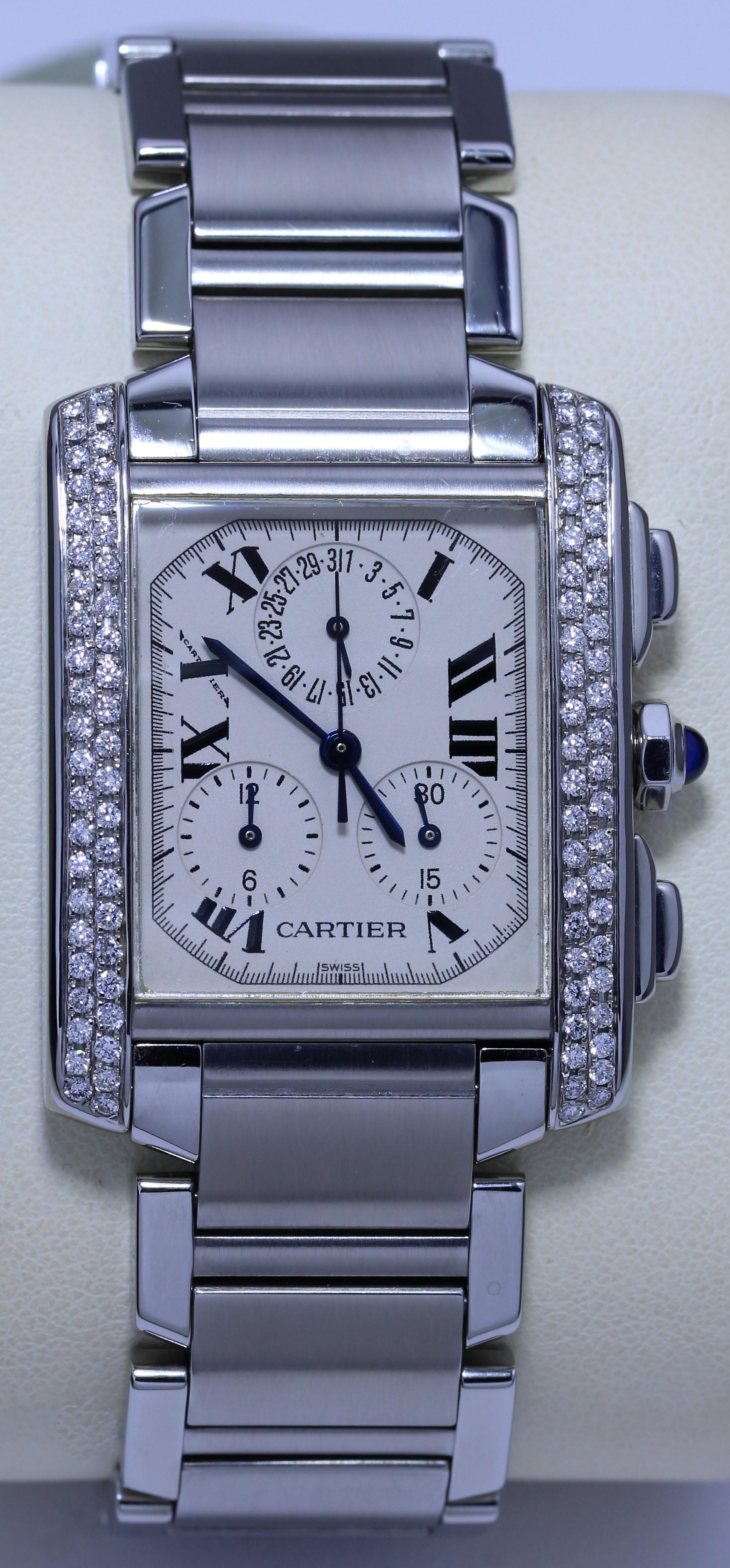 Cartier Diamond Studded Wristwatch
Rectangular face with bezel studded with diamonds
Roman numeral hour markers
172947127538-E
 Cartier Pre-Owned Tank Francaise W51004Q4
 Case Diameter: 28mm x 36mm
Band Size: 180mm
Cartier Tank Francaise Chronoflex