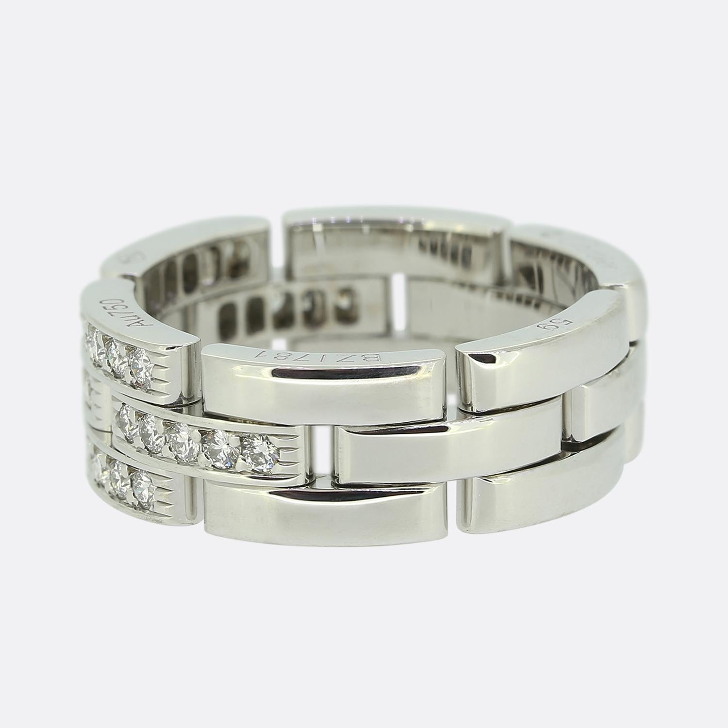 Here we have a fabulously crafted 18ct white gold diamond ring from the world renowned luxury jewellery house of Cartier. The design features three rows of round brilliant cut diamonds set at the centre of the face in a sleek, geometric pattern.