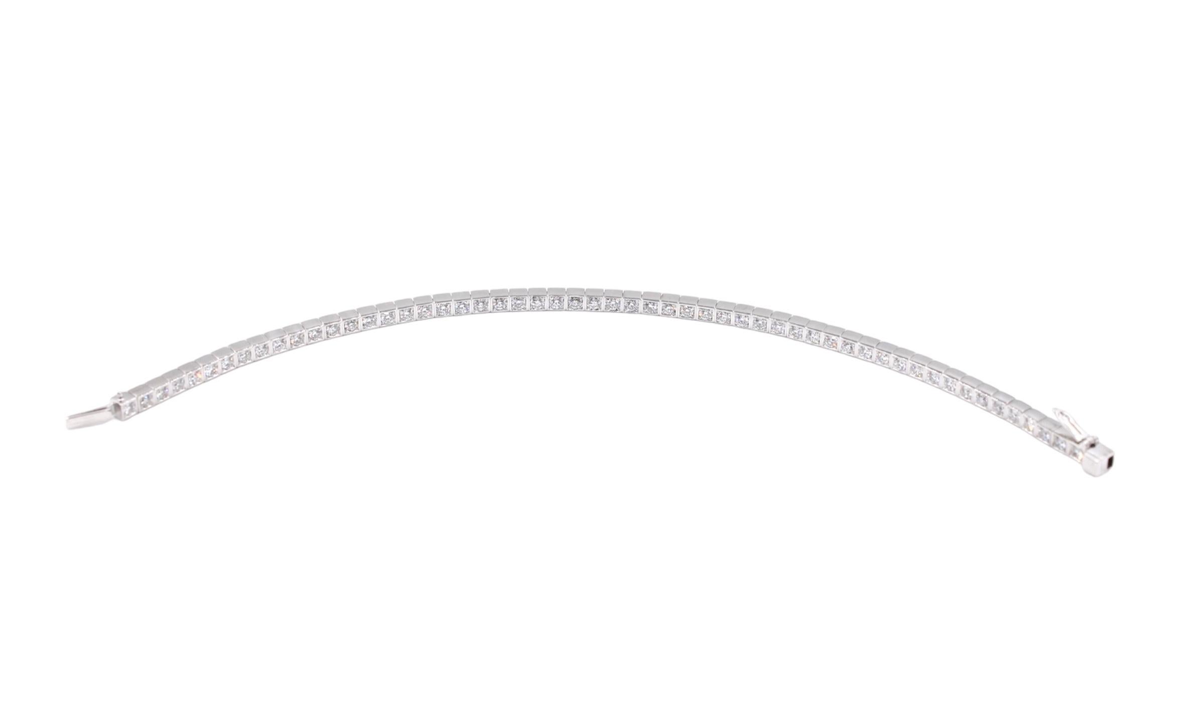Vintage tennis bracelet signed by the famous jewelry house Cartier. 

The cartier vintage tennis bracelet is made of white gold 18k and set with 55 high quality diamonds for approximately 2.20 Carats total ( Estimated F/G color - Vs clarity). All