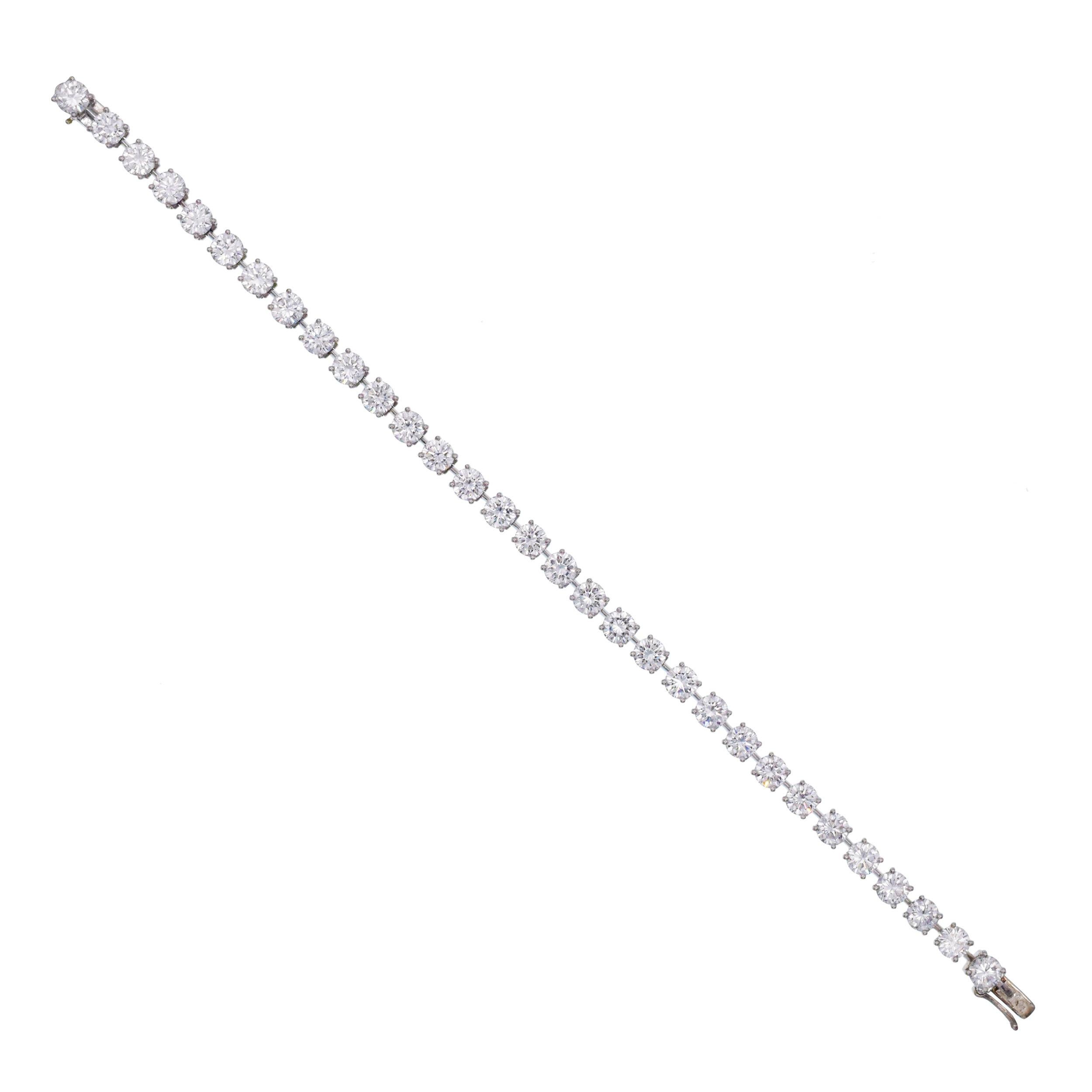 Round Cut Cartier Diamond Tennis Bracelet in Platinum.