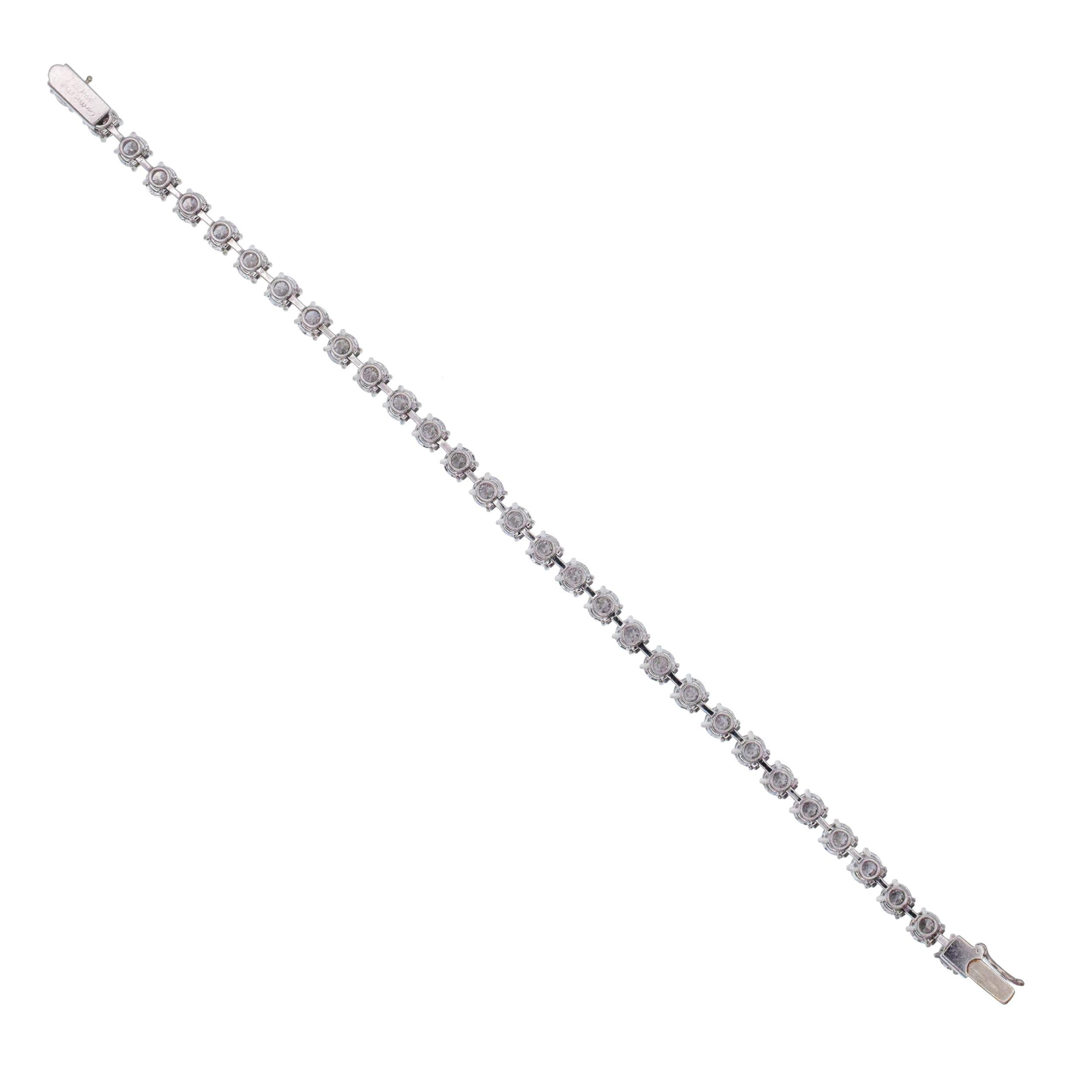 Women's or Men's Cartier Diamond Tennis Bracelet in Platinum.
