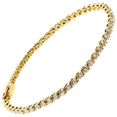 Bracelet tennis diamant Cartier en or jaune