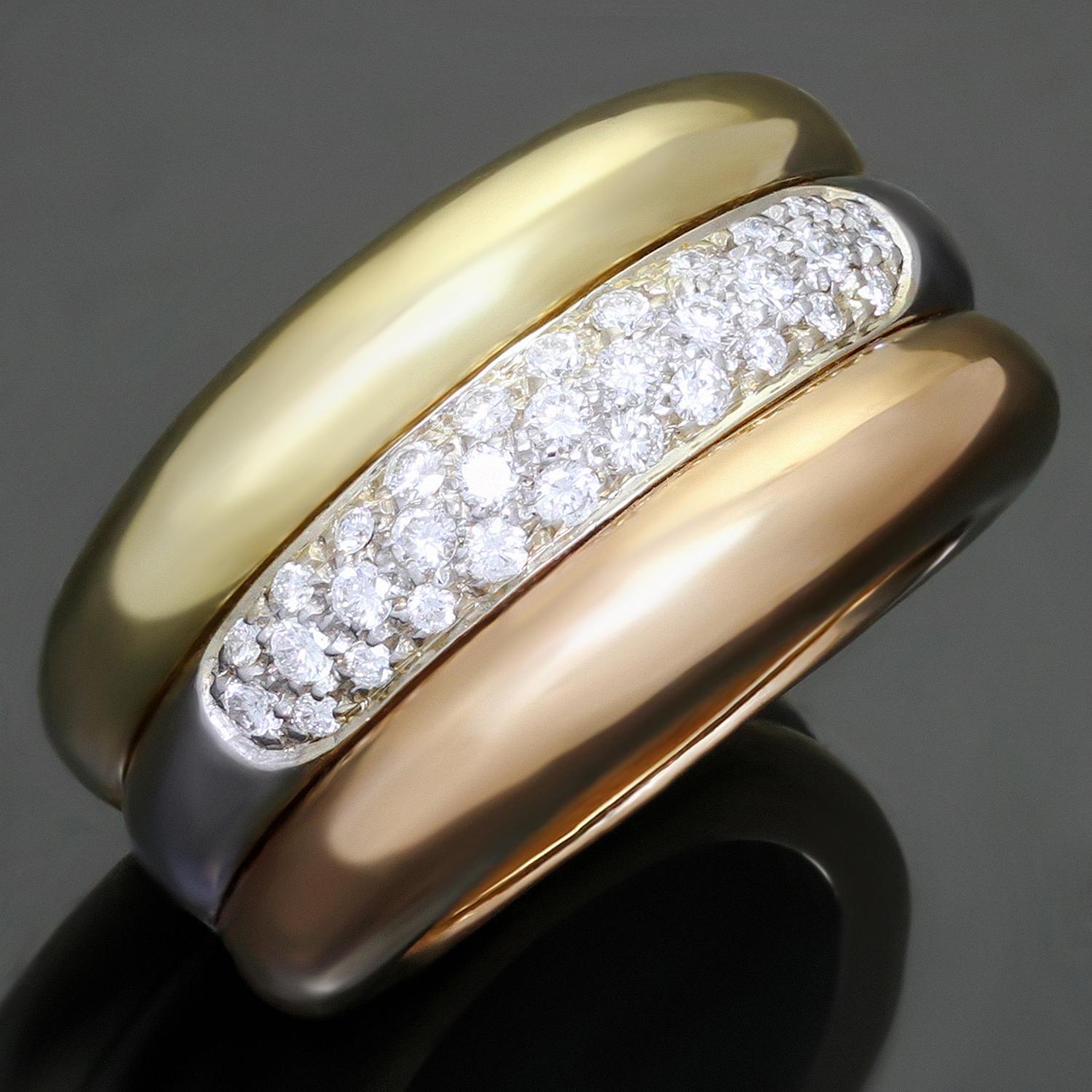 Dieser wunderschöne gewölbte Ring aus der Trinity-Kollektion von Cartier ist aus 18 Karat Gelb-, Weiß- und Roségold gefertigt und mit runden Diamanten im Brillantschliff (F-G VVS1-VVS2) mit einem geschätzten Gesamtgewicht von 0,67 Karat in Weißgold