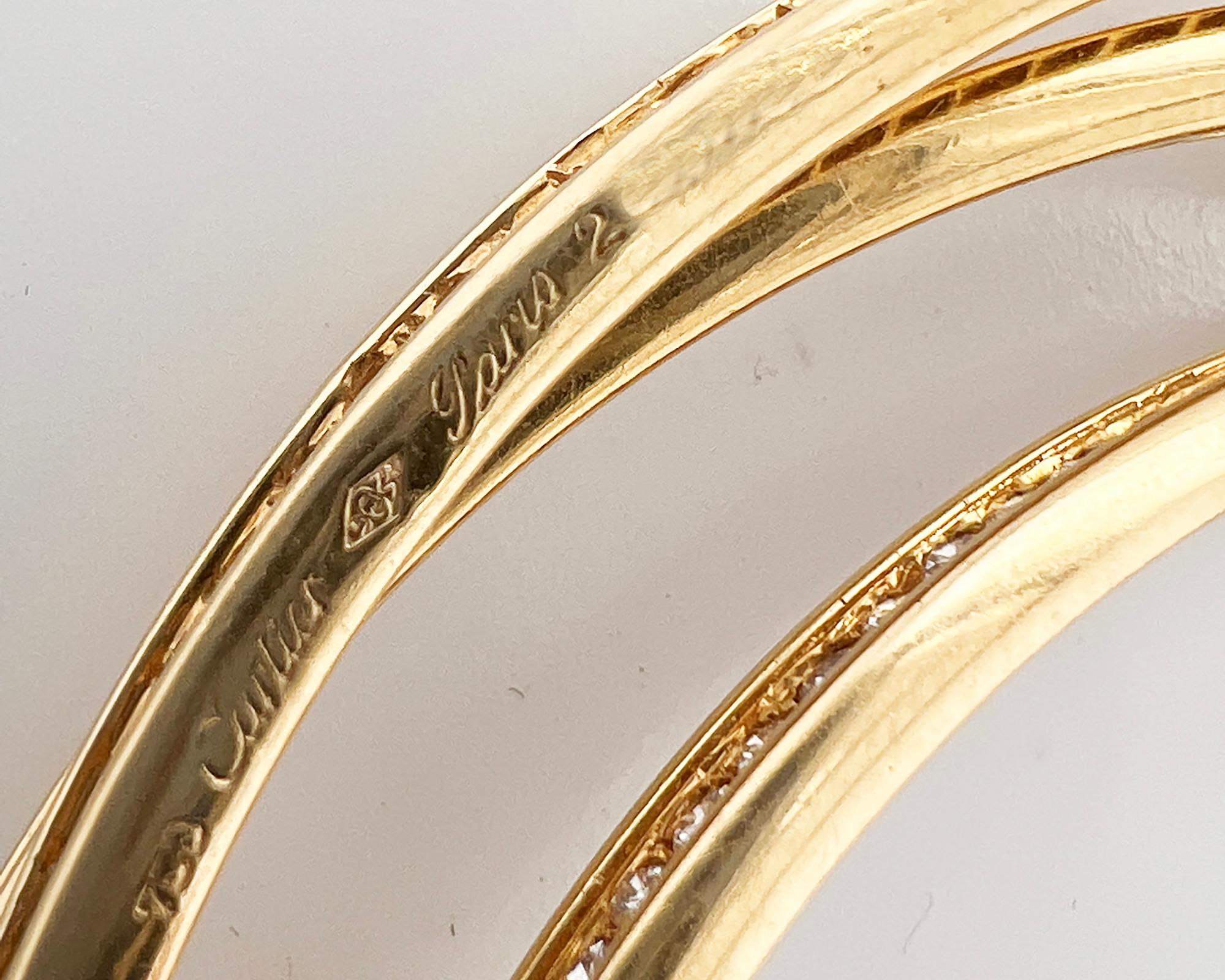 Taille ronde Cartier Bracelet jonc « Trinity » en or jaune 18 carats et diamants en vente
