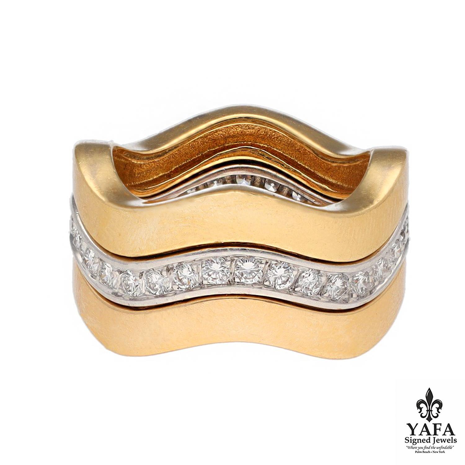 18K Yellow, White, and Rose Gold Neptune Wave Stackable Bands of 3. This Famous Cartier Trinity Motif is Augmented by Brilliant Diamonds Stationed within the White Gold Band. Furthermore, Each Band is Repositionable or Can be Enjoyed Alone. 

Circa