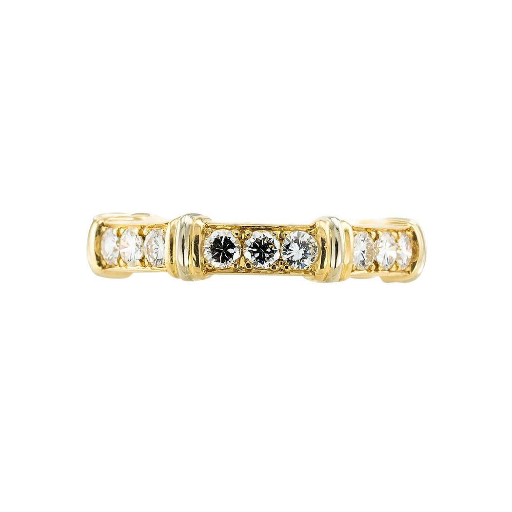 Bague d'éternité en diamant et or bicolore de Cartier, circa 1990. Jacob's Diamond & Estate Jewelry.

SPÉCIFICATIONS :

DIAMANTS :  vingt-et-un diamants ronds de taille brillant totalisant environ 0,75 carat, de couleur F-G environ, de pureté