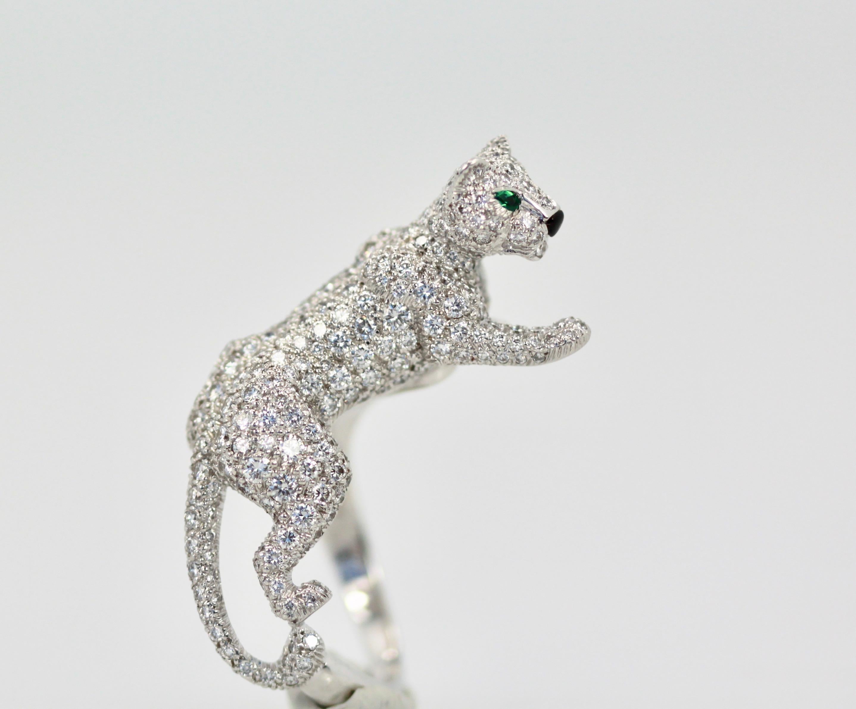 This amazing Cartier Panthere Ring is now discontinued and a beauty. Hard to find this panthere covers your finger as the Panthere looks to be walking down your finger.  Completely covered in Diamonds White Gold 18K and is a size 6