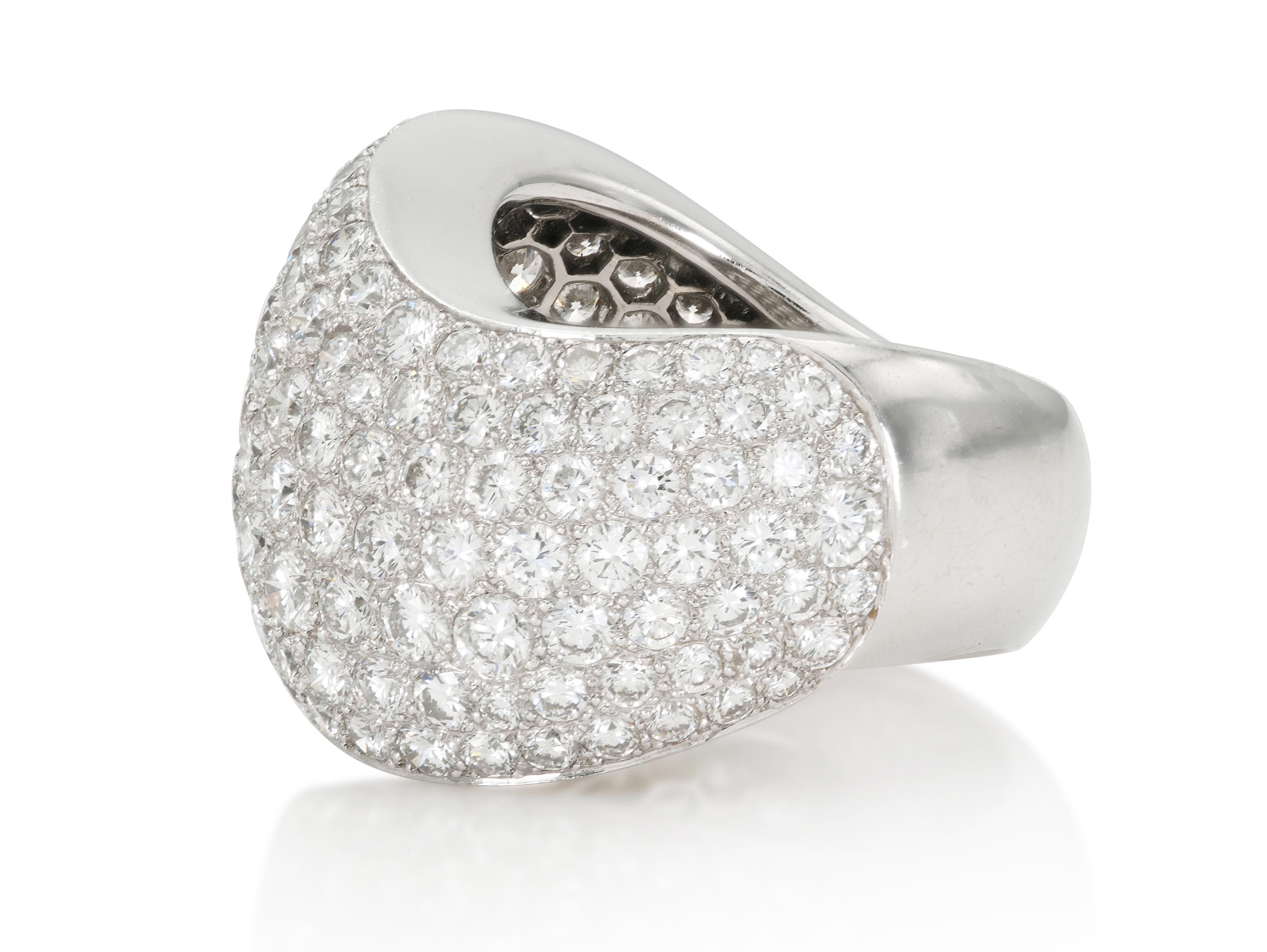 Finely crafted in 18k white gold with Round Brilliant Diamonds weighing approximately 7.65 carats.
Signed by Cartier
Size 6 1/2