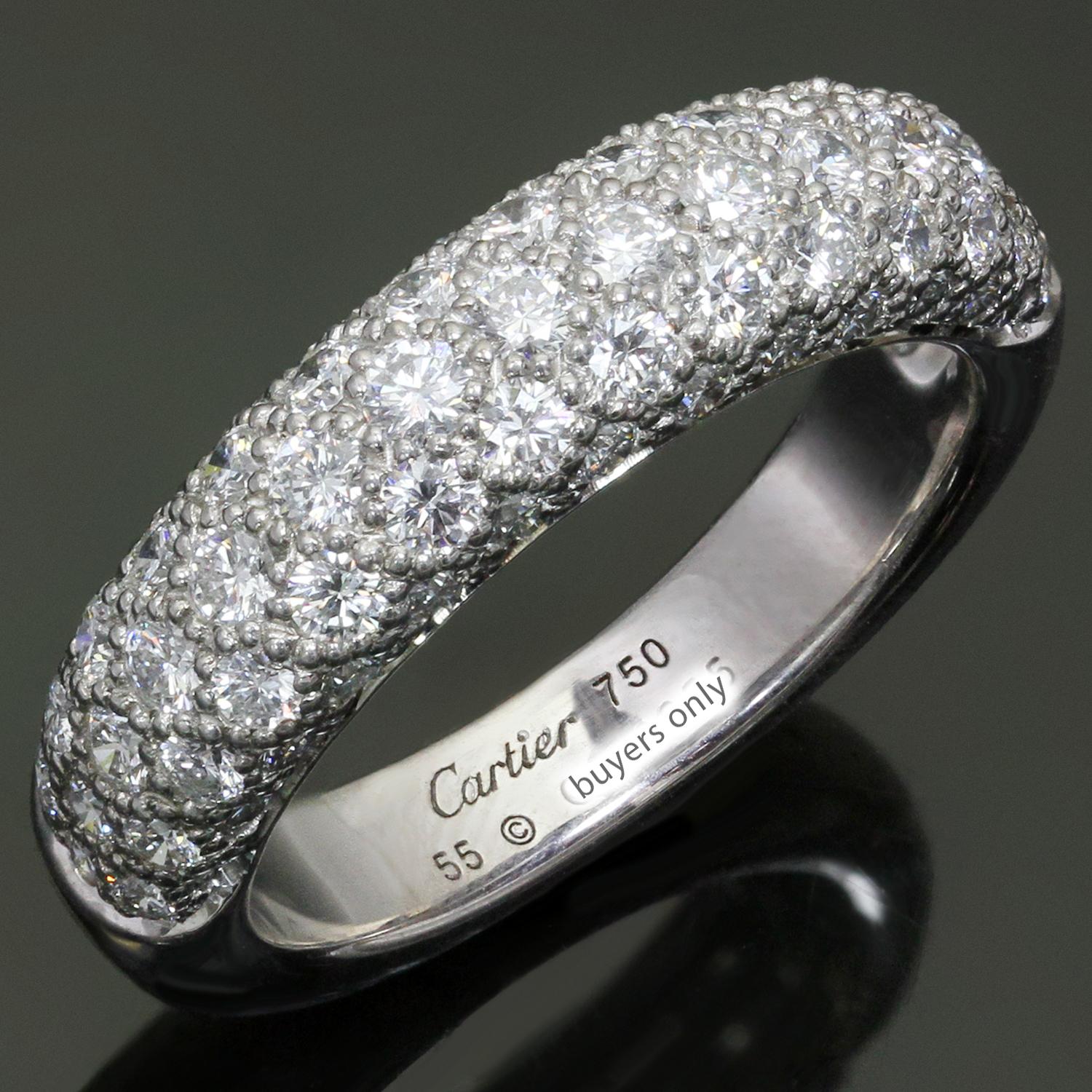 This classic and timeless Cartier ring is crafted in 18k white gold and pave  set with round brilliant D-F VVS1-VVS2 diamonds weighing an estimated 1.7 carats Made in France circa 1980s. Measurements: 0.23