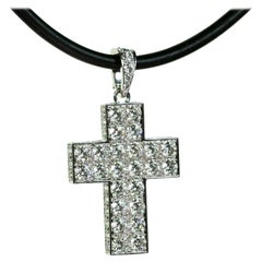 Cartier, collier pendentif croix en or blanc et diamants