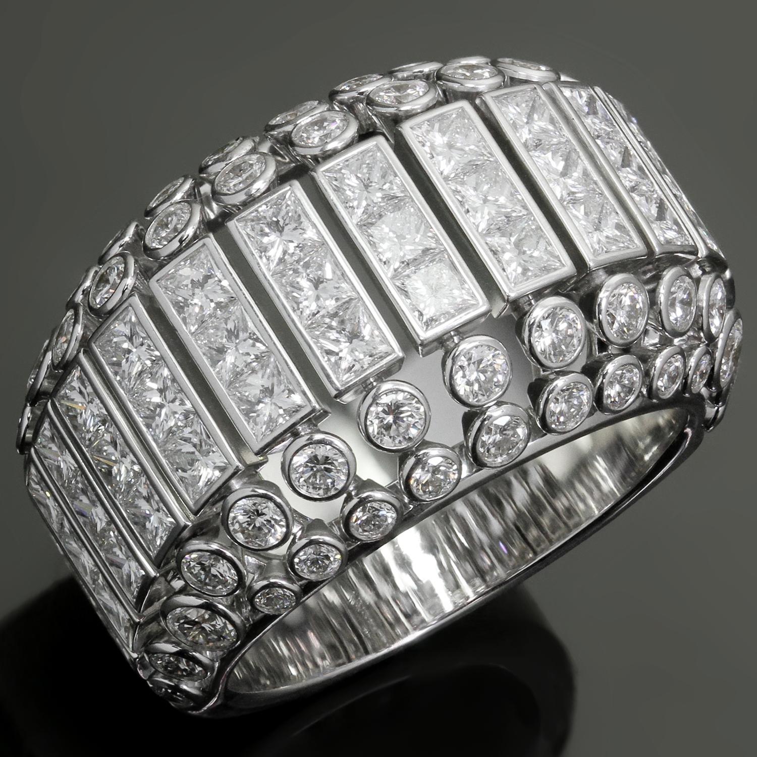 This magnificent Cartier ring features a gorgeous domed design crafted in 18k white gold and and set with round brillant-cut and princess-cut D-F VVS1-VVS2 diamonds weighing an estimated 5.0 carats. Made in France. Measurements: 0.59