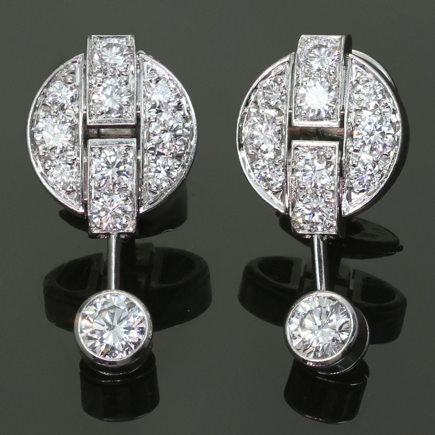 These gorgeous Cartier drop earrings are crafted in 18k white gold and set with brilliant-cut round D-F VVS1-VVS2 diamonds weighing an estimated 1.12 carats. Made in France circa 2000s. Measurements: 0.38