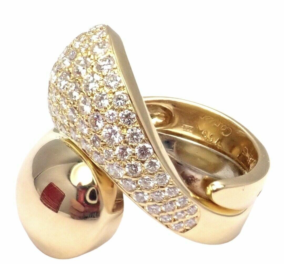 18k Yellow Gold Diamond Carmelo Ying Yang Ring by Cartier.
With 80 Round Brilliant Cut Diamond VVS1 clarity, E color total weight approx. 2.5ctw
This ring comes with original Cartier box.

Details:
Ring Size: European 56 US 7 1/2
Weight: 21