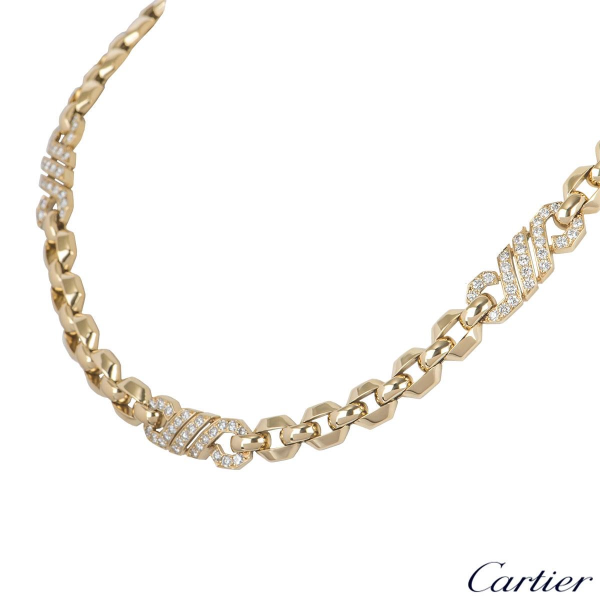 A beautiful 18k yellow gold and diamond necklace by Cartier. The necklace features octagonal links connected by 3 diamond plaques which are set with 75 round brilliant cut diamonds with an approximate weight of 3.00ct. The necklace has a box clasp