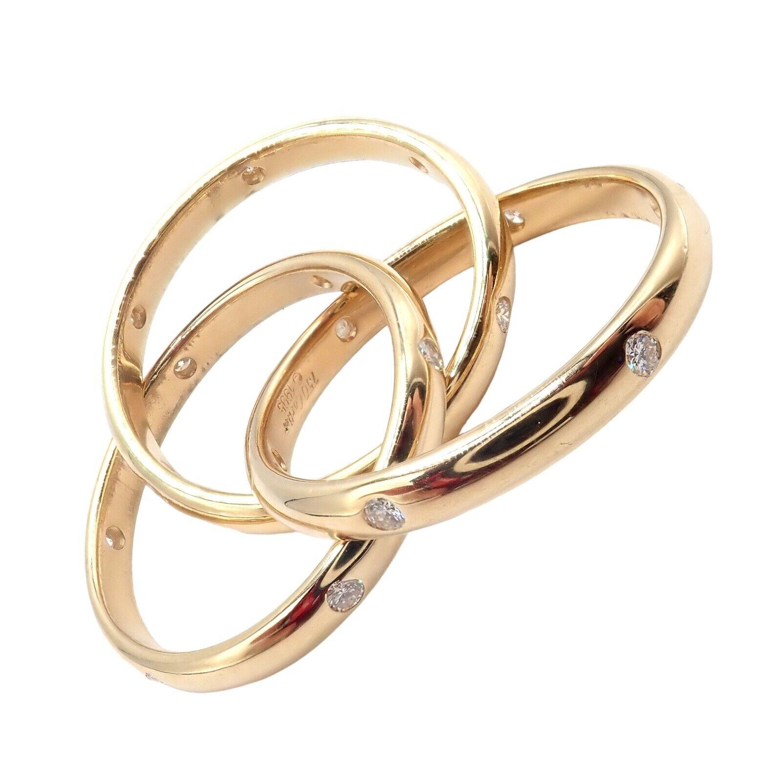 The Authentic! Cartier 18k Yellow Gold Diamond Trinity Ring is a stunning piece of jewelry. Crafted from 18k yellow gold, it features a timeless and elegant design. The ring is adorned with sparkling diamonds, adding a touch of luxury and