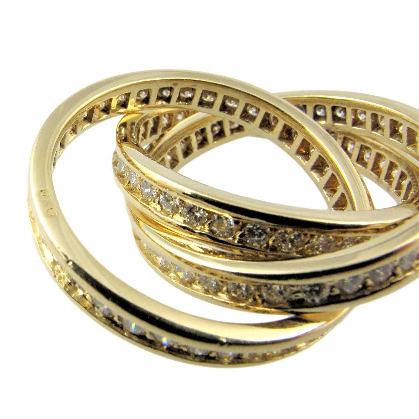 Modern Cartier Diamond Yellow Gold US 7 1/2 Trinity Ring.  For Sale