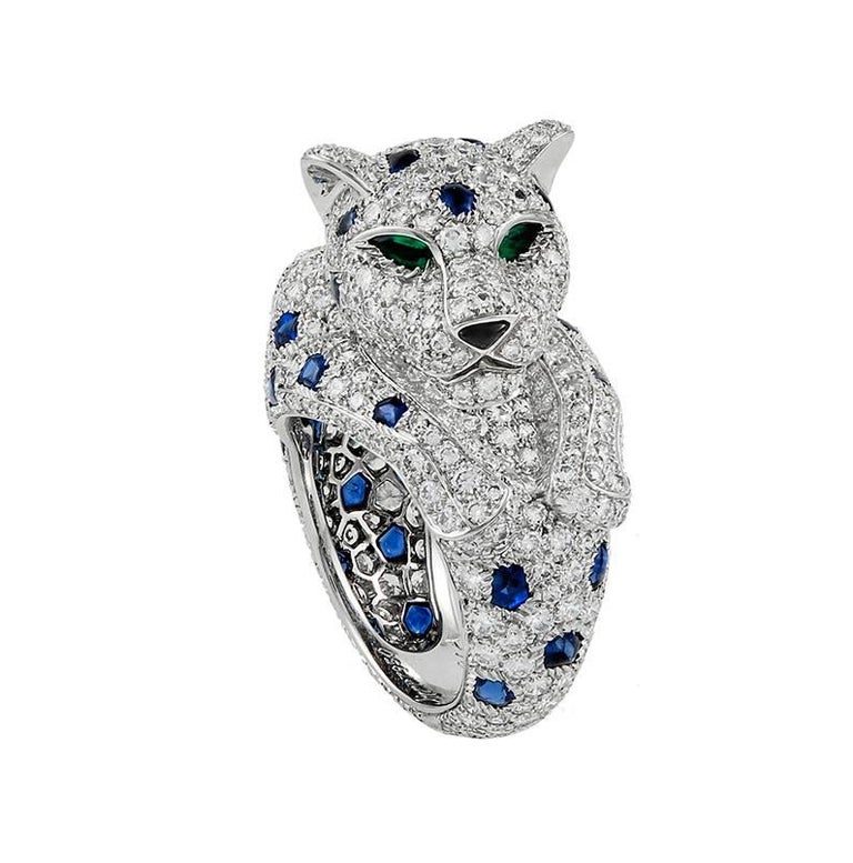 The famed Jeanne Toussaint Panther designs worn by the Duchess of Windsor and Barbara Hutton and otherr iconic Cartier clients
Platinum diamond, sapphire, emerald eyes and onyx nose Panthere de Cartier ring.
Ring size 6.5