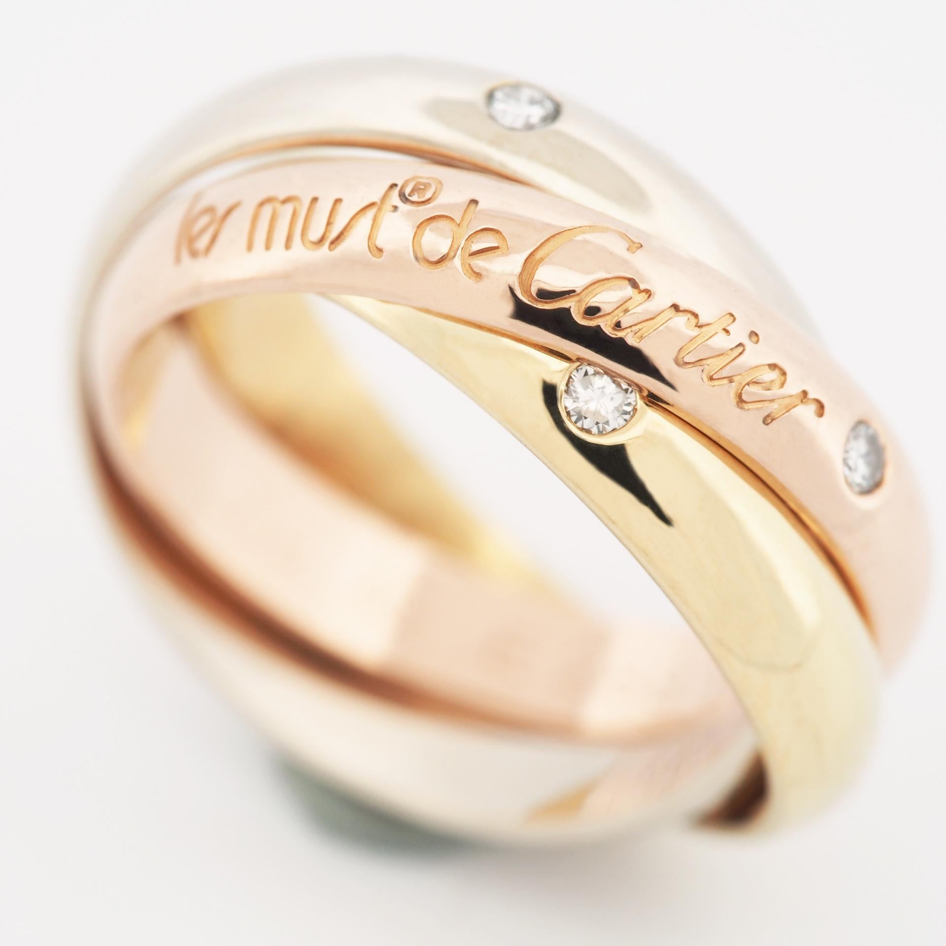 Item: Authentic Cartier Trinity Ring ( 150th Anniversary Limited Edition )
Stones: 3 diamonds
Metal: 18K Yellow / Rose / White Gold
Ring Size: 49 US SIZE 4.75 UK SIZE I 3/4
Internal Diameter:  15.50 mm
Measurement:  3.4 mm
Weight:  8.8