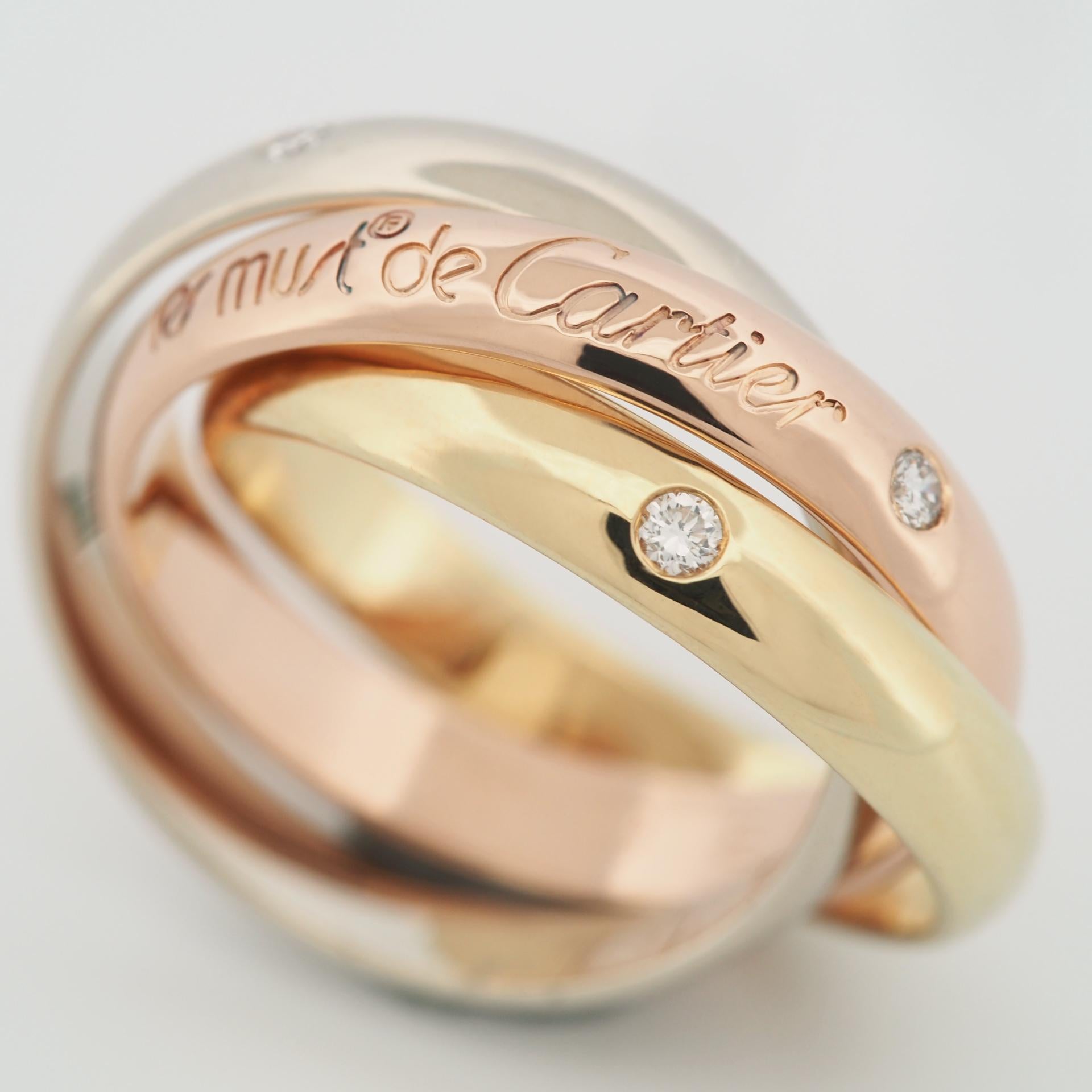 Item: Authentic Cartier Trinity Ring ( 150th Anniversary Limited Edition )
Stones: 3 diamonds
Metal: 18K Yellow / Rose / White Gold
Ring Size: 49 US SIZE 5.0 UK SIZE J 1/4
Internal Diameter:  15.65 mm
Measurement:  3.4 mm
Weight:  8.6