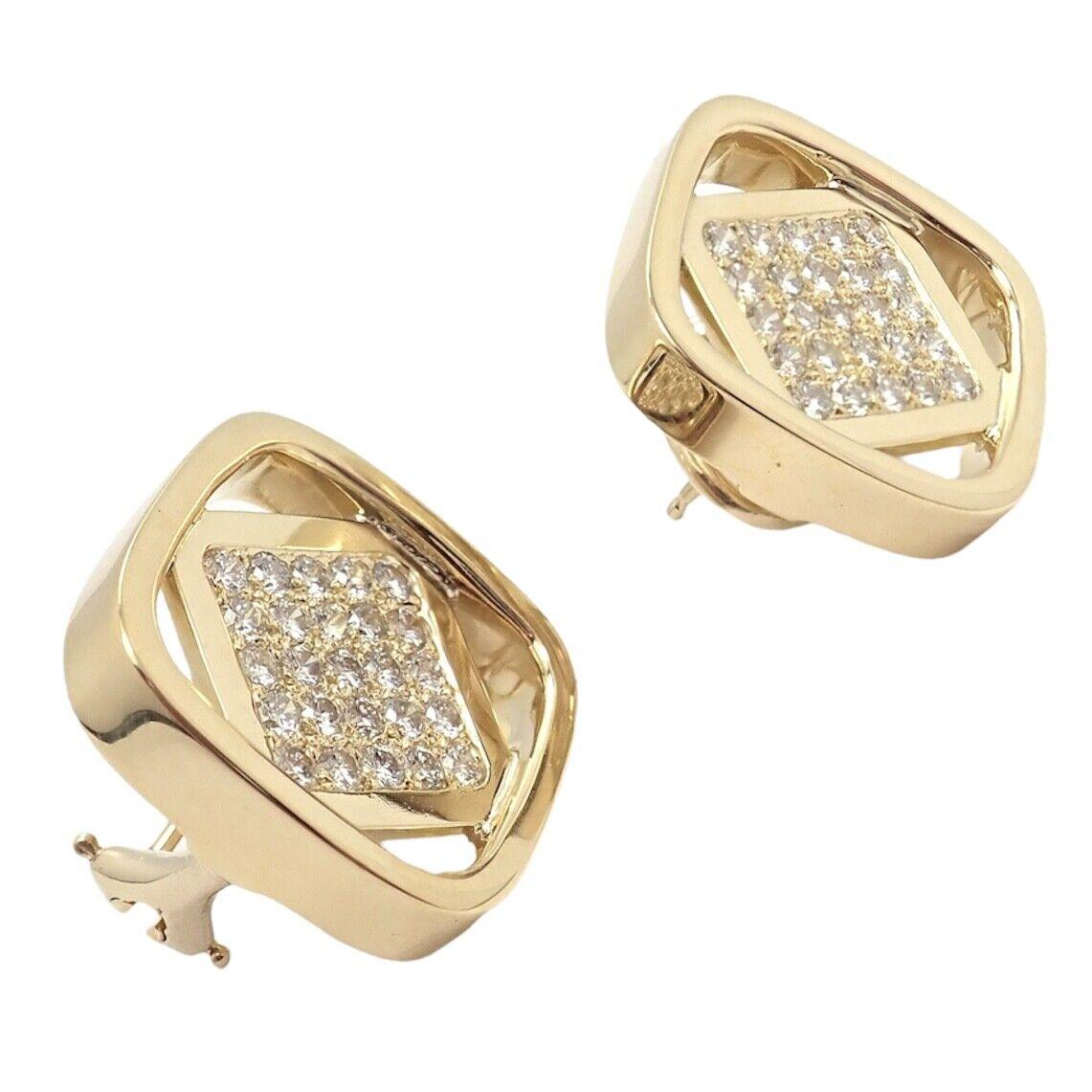 18k Yellow Gold Diamond Earrings by Dinh Van for Cartier from the 1970's.
With 50 round brilliant cut diamonds VVS1 clarity, E color total weight approximately 1.50ct
This stunning pair of earrings come with a Cartier box.
Details: 
Weight: 18.4
