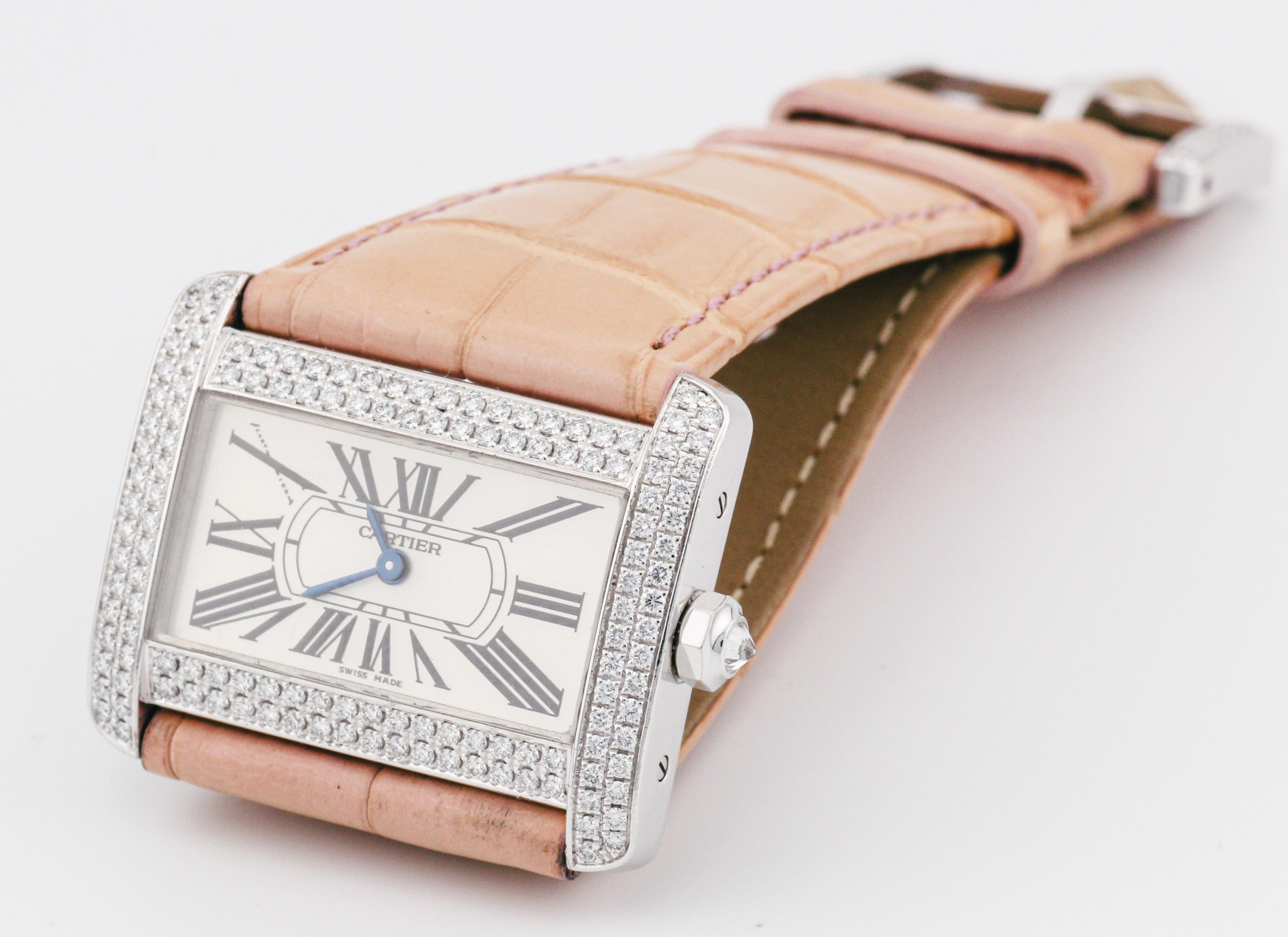 The Cartier Divan 18K White Gold Watch with 2 Rows Diamond Bezel and leather strap, featuring a Diamond Buckle, is a true embodiment of Cartier's legacy of luxury, sophistication, and timeless design. This exceptional timepiece marries the pristine