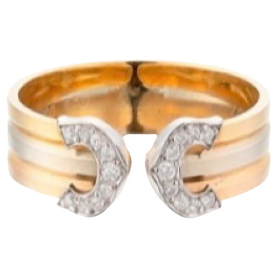 Anello Cartier Doppia C in oro e diamanti 18 carati