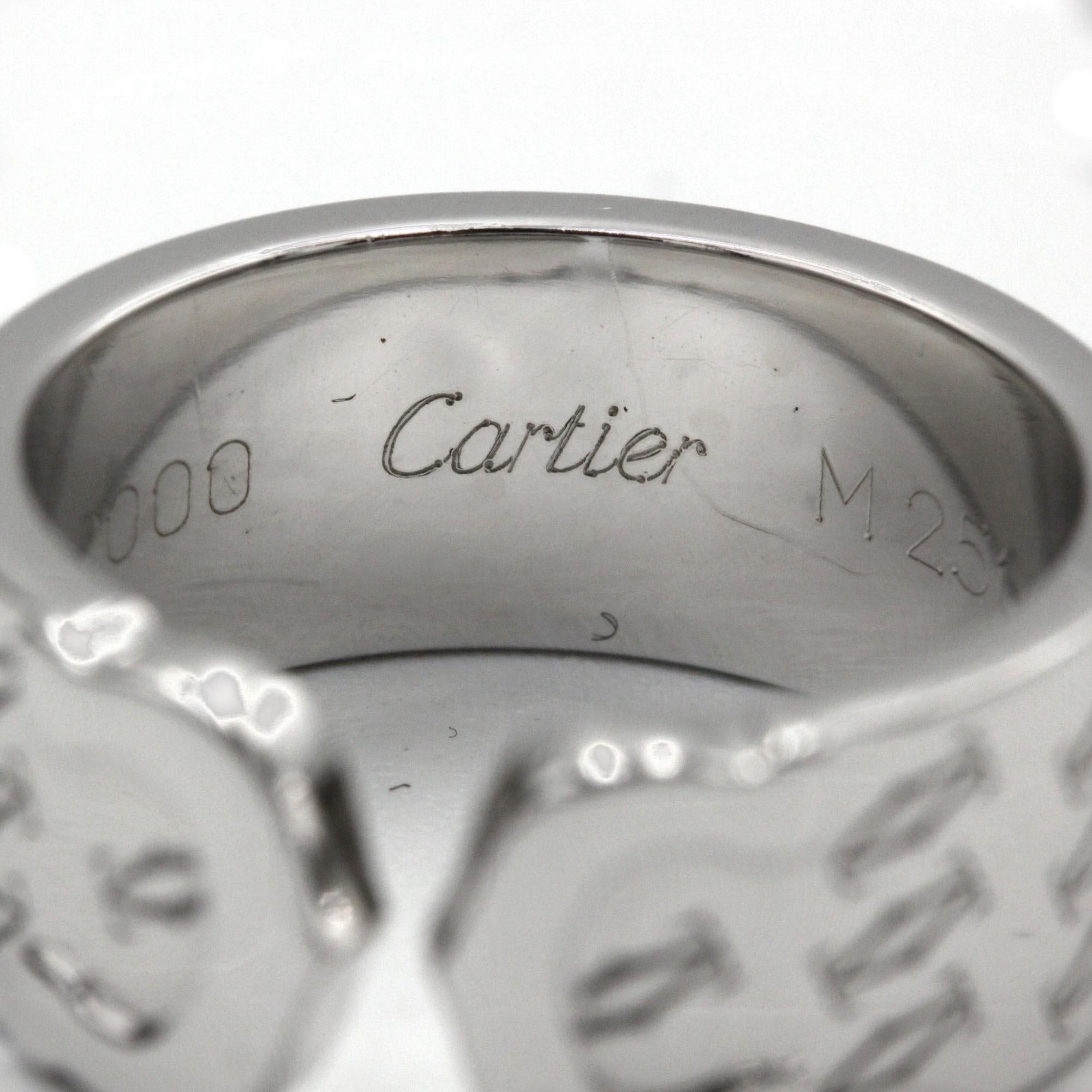 Anchored in Cartier’s unmistakable aesthetic, this bold signet ring from the late 1990s is fully crafted in polished 18K white gold. The sculptural band, engraved all around with the maison’s iconic “Double C” motif, meets at the top in two stylized