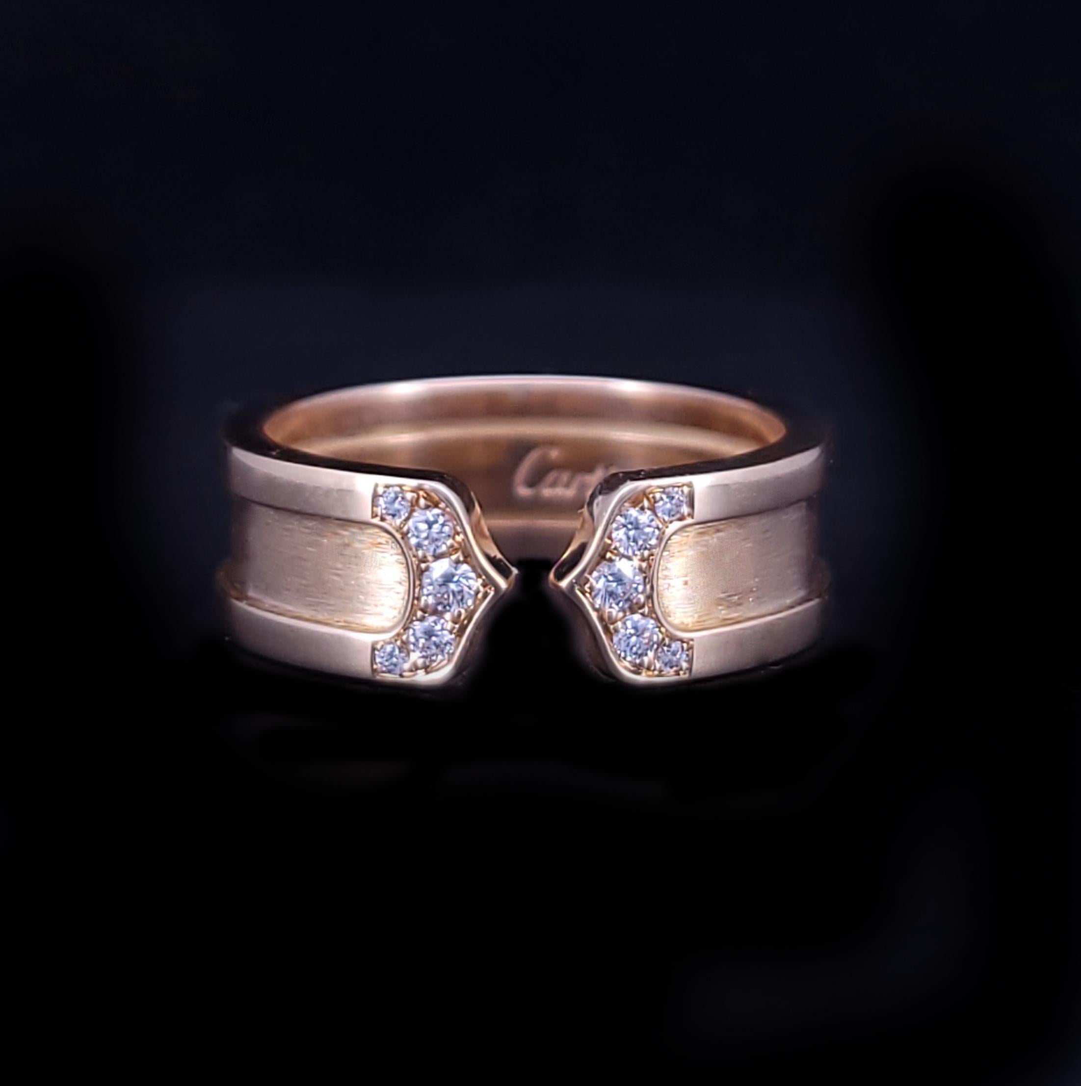 ANELLO CON DIAMANTE IN ORO 18K CARTIER DOUBLE C

-Metallo: oro giallo 18k
-Dimensioni: 6,25
-Spessore: 6,5 mm
-A. Stone: Diamanti
-Peso: 7,4 grammi

Est. Vendita al dettaglio: $4,500