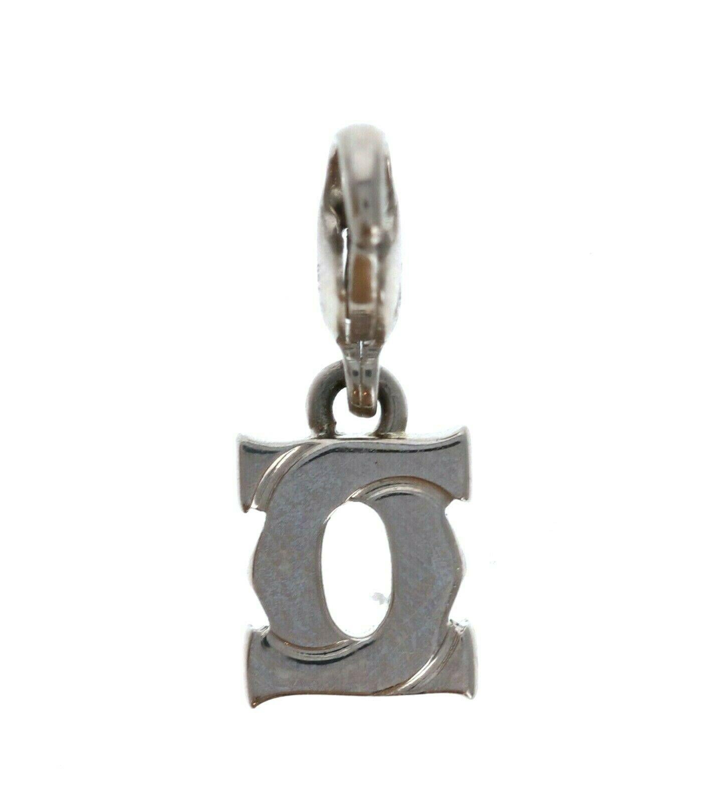 Authentic Cartier Double C Charm 18K White Gold 

For sale is a 18K white gold Cartier double C charm 
 Perfect worn day or night.
 Get this stunning charm now!
16cm length including the bail


Metal: 18k white Gold
     
Hallmark: Cartier 750