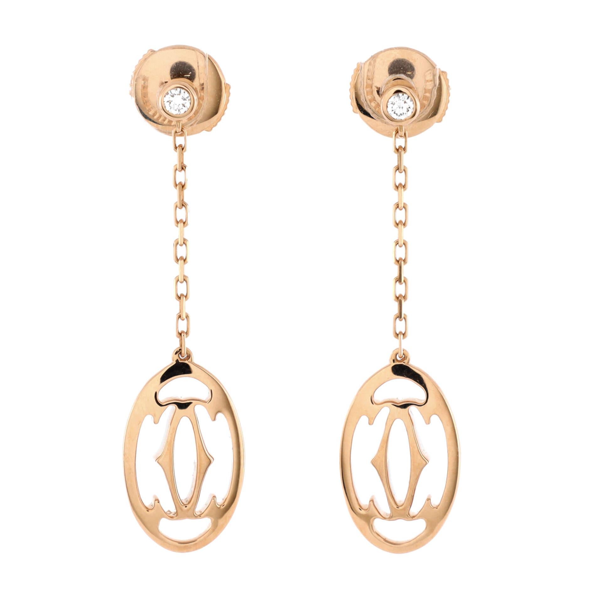 Condition: Great. Minor wear throughout.
Accessories:
Measurements: Height/Length: 35.80 mm, Width: 9.30 mm
Designer: Cartier
Model: Double C de Cartier Drop Earrings 18K Rose Gold with Diamonds
Exterior Color: Rose Gold
Item Number: 224640/3