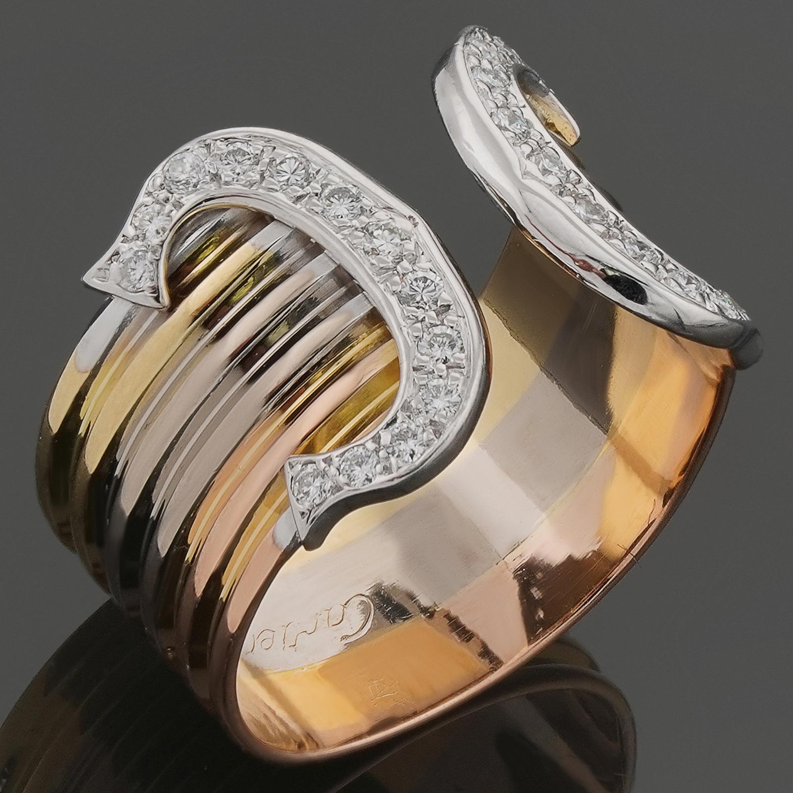 This elegant Cartier open ring features a 3-band design crafted in 18k yellow, white, and rose gold and completed with the iconic Double C ends set with brilliant-cut round E-F-G	VVS1-VVS2 diamonds. Made in France circa 1990s. The ring size slightly