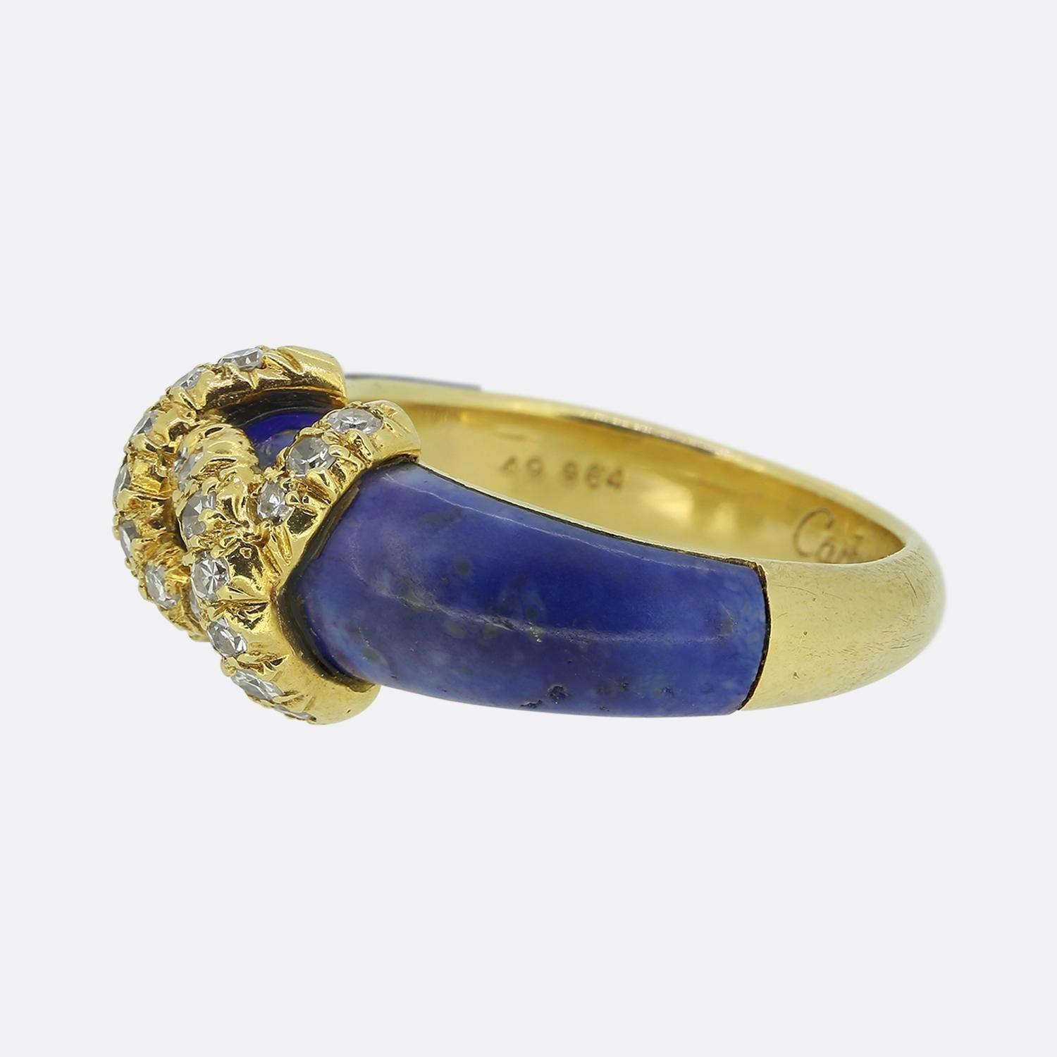Here we have a striking ring from the world renowned luxury jewellery house Cartier. This vintage piece has been crafted from a rich 18ct yellow gold and showcases Cartier's iconic double 'C' logo at the centre of the face. This motif has been