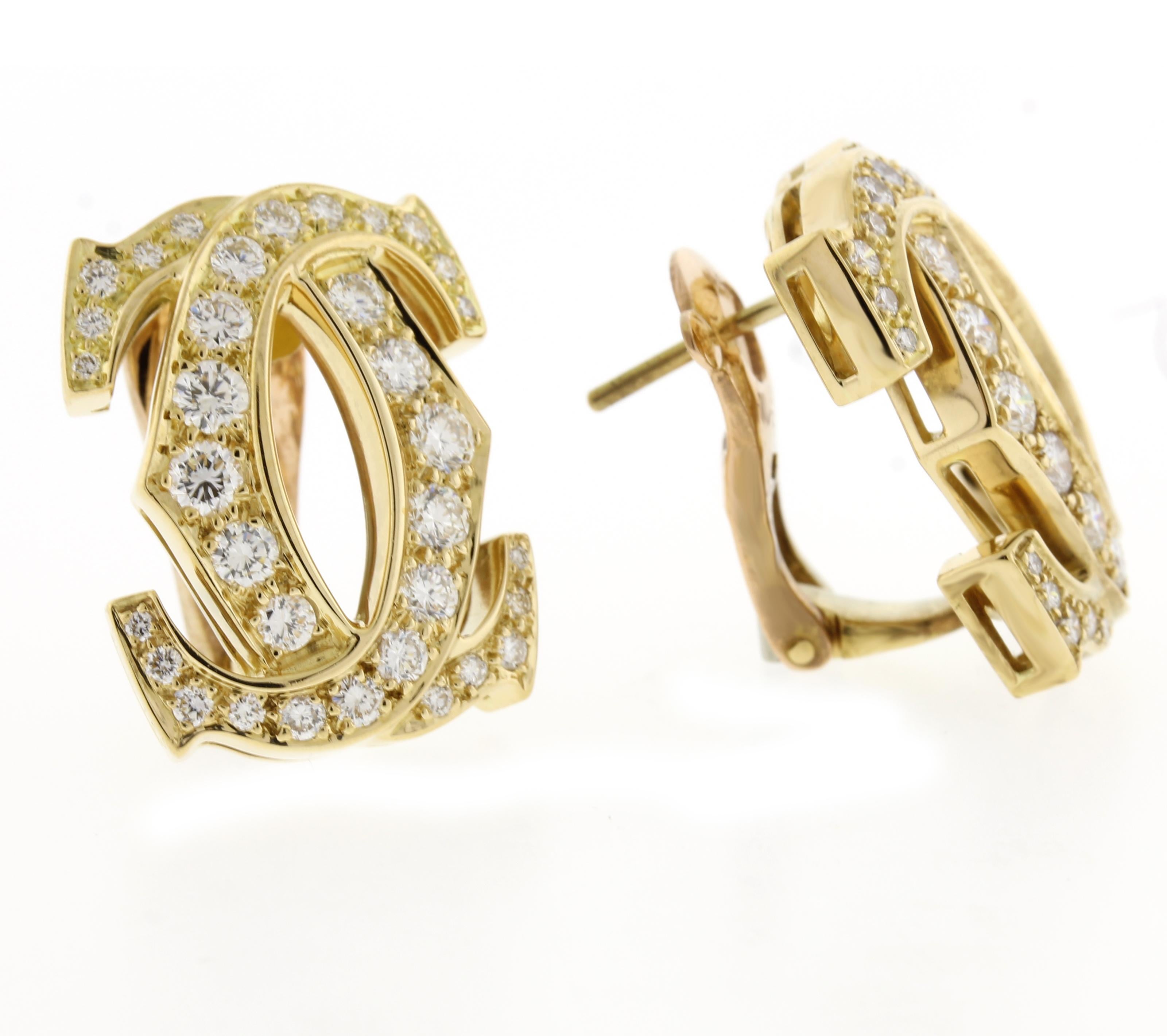 Two mirror image diamond Cartier C motifs intertwine to create these elegant and iconic earrings.
♦ Designer: Cartier
♦ Metal: 18 karat
♦2002
♦ 21X16mm
♦ 68dia=2.25
♦ Original Cartier box and sales receipt 
♦ Condition: Excellent , pre-owned
♦