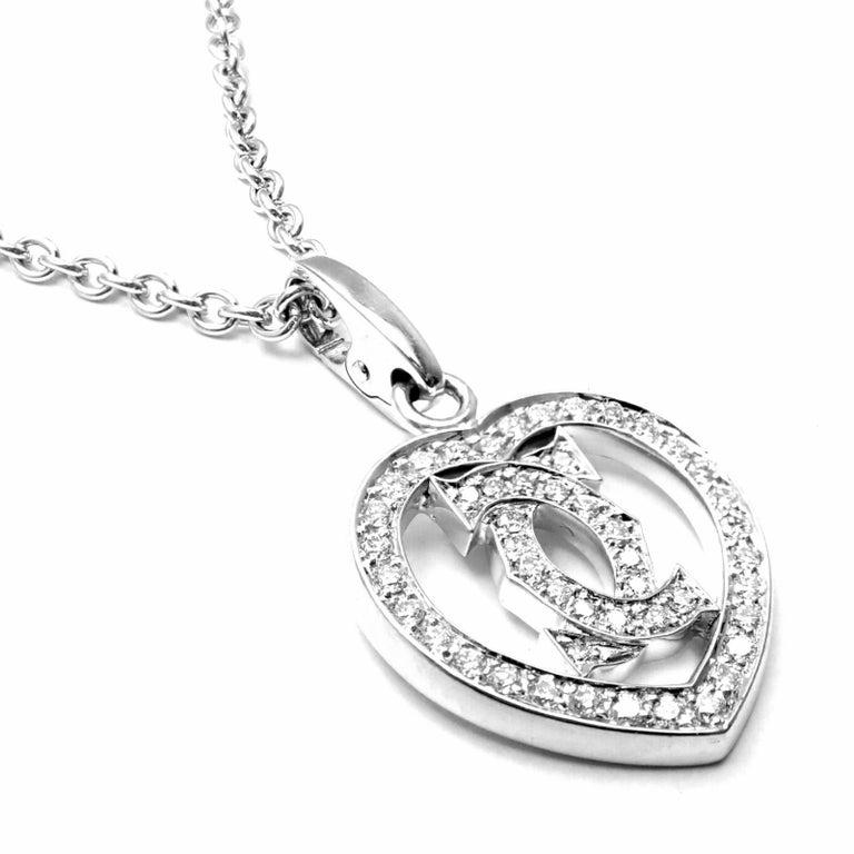 18k White Gold Diamond Heart Double C Pendant Necklace by Cartier.
With 49 round brilliant cut diamonds
VVS1 clarity, E color total weight approx. .50ct
This necklace is in mint condition and comes with original Cartier box.
Details:
Chain Length: