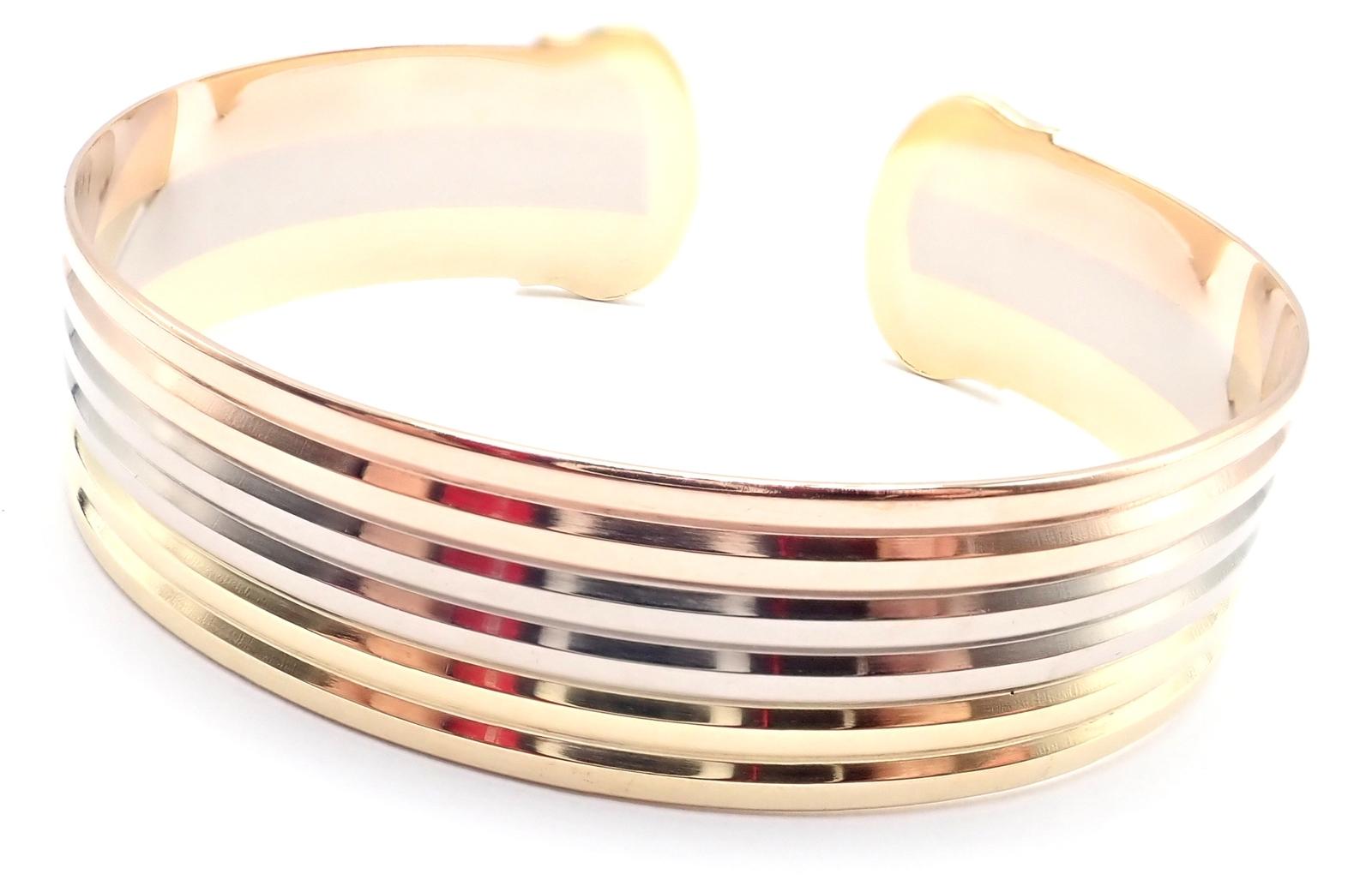 Pulsera brazalete trinitaria doble C tricolor de oro Cartier en Excelente estado para la venta en Southampton, PA