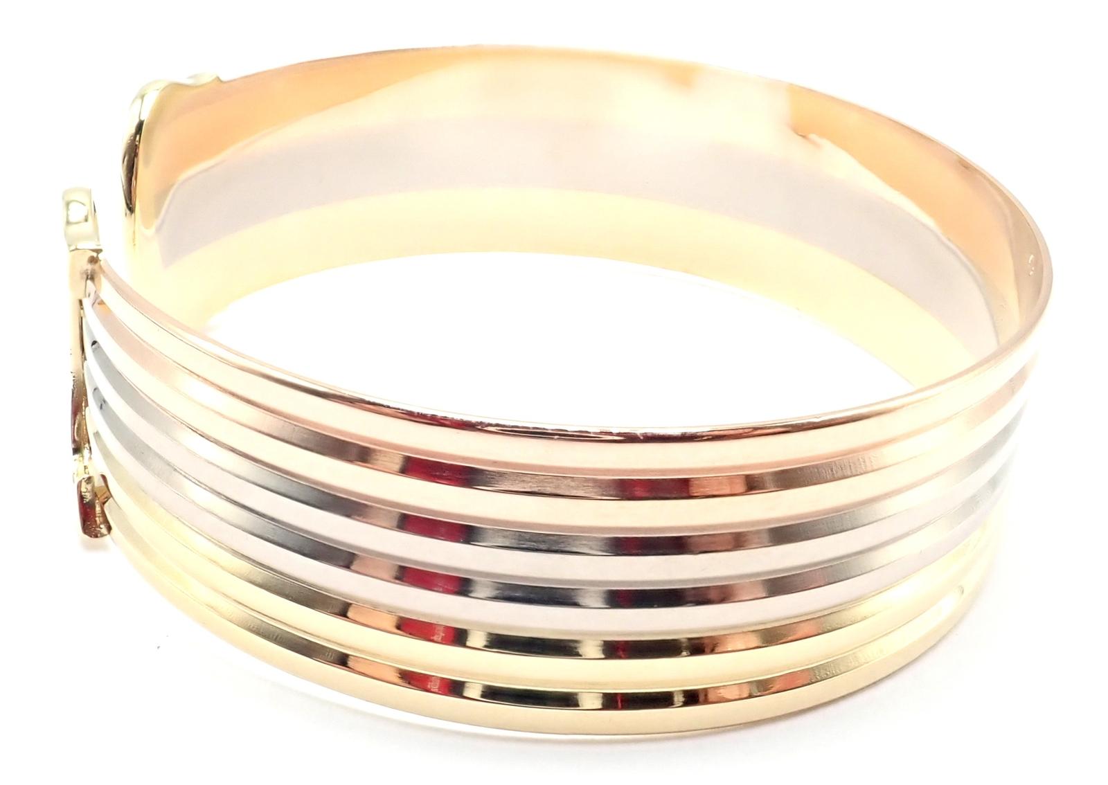 Femenino o masculino Pulsera brazalete trinitaria doble C tricolor de oro Cartier en venta