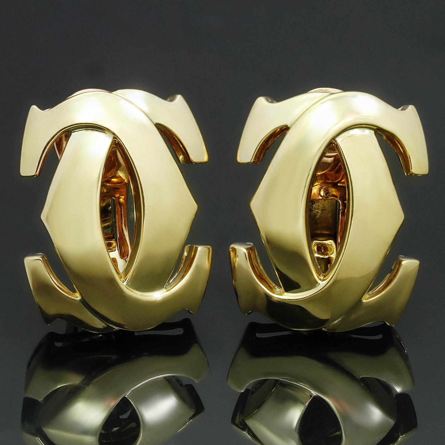 Iconic Cartier earrings featuring the Double C design crafted in 18k yellow gold. Classic and fabulous! These earrings have clip-on backs but posts can be added upon request for pierced ears at no extra charge. Made in France circa 1990s.