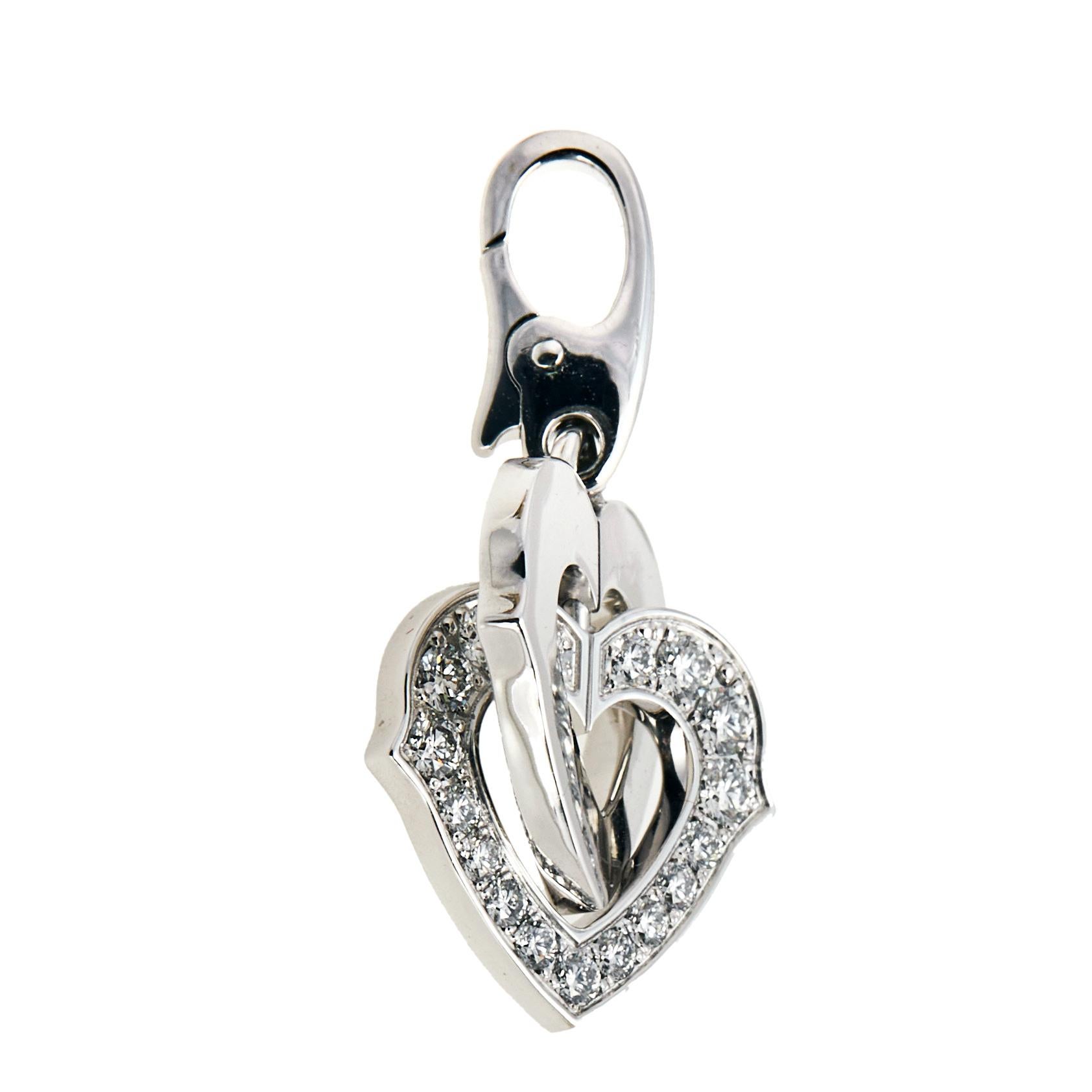 Show your love for elegant, feminine designs when you add this cute heart charm to your collection. crafted from 18K white gold, the charm features two interlocked hearts, one of which is decorated with shimmery diamonds. It is complete with a