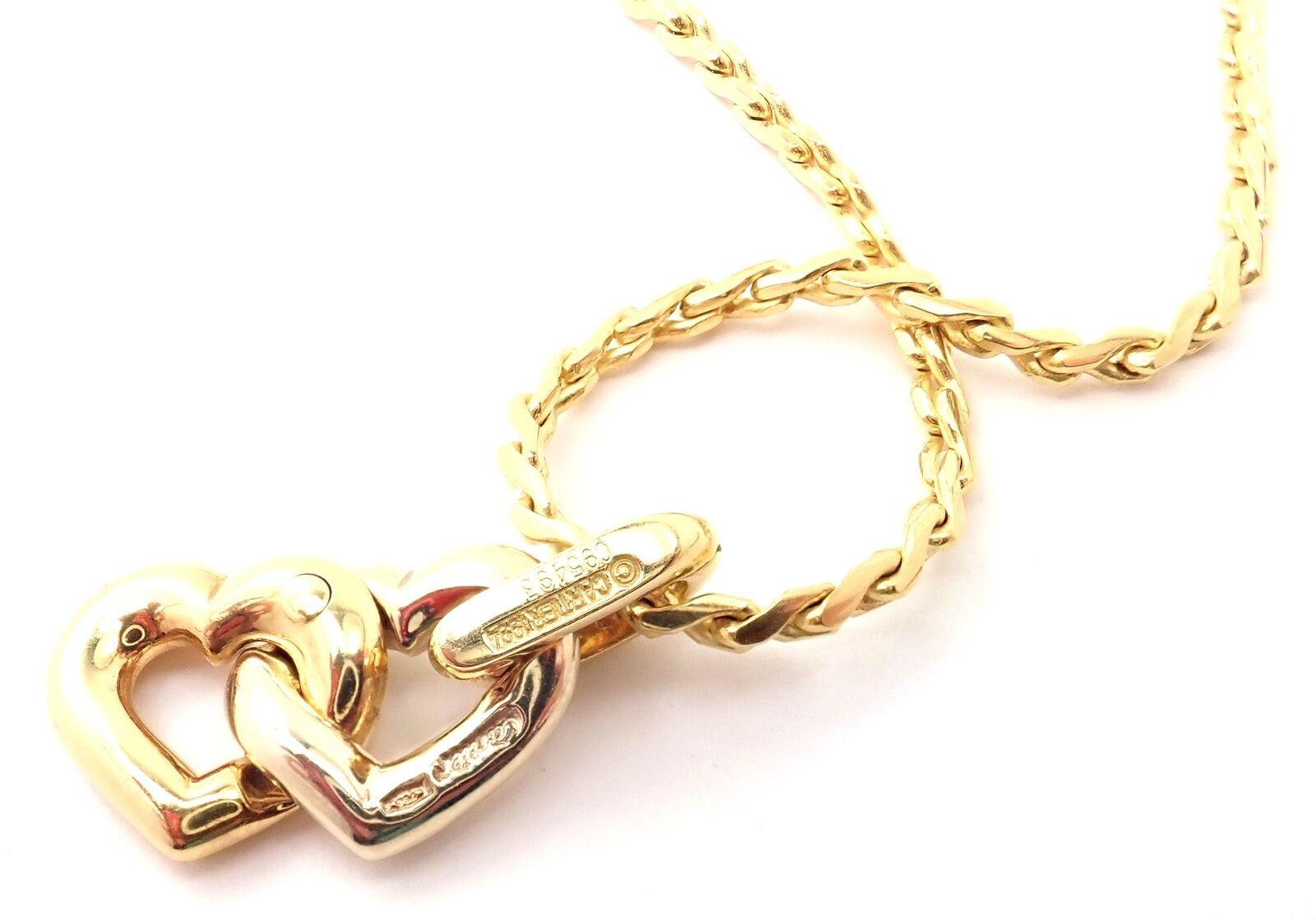 Cartier Collier à pendentif double cœur en or jaune et blanc avec chaîne en vente 1