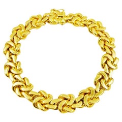 Cartier Gelbgold-Gliederarmband mit doppeltem Knoten
