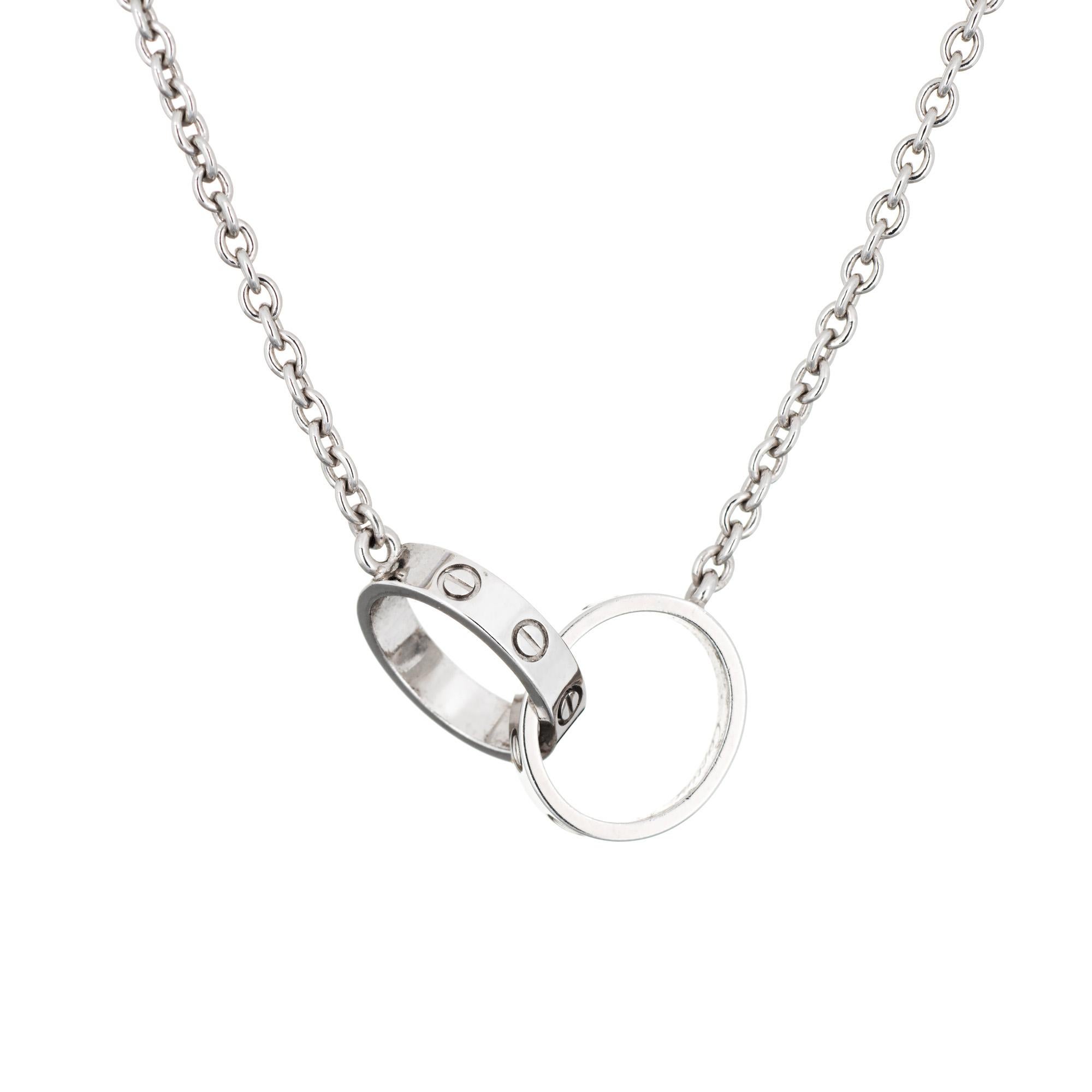 Pre-owned Cartier Double Love necklace crafted in 18k white gold.  

The Cartier necklace features two interlocking love links. The necklace is great worn alone or layered with your fine jewelry from any era. The necklace comes with a Cartier