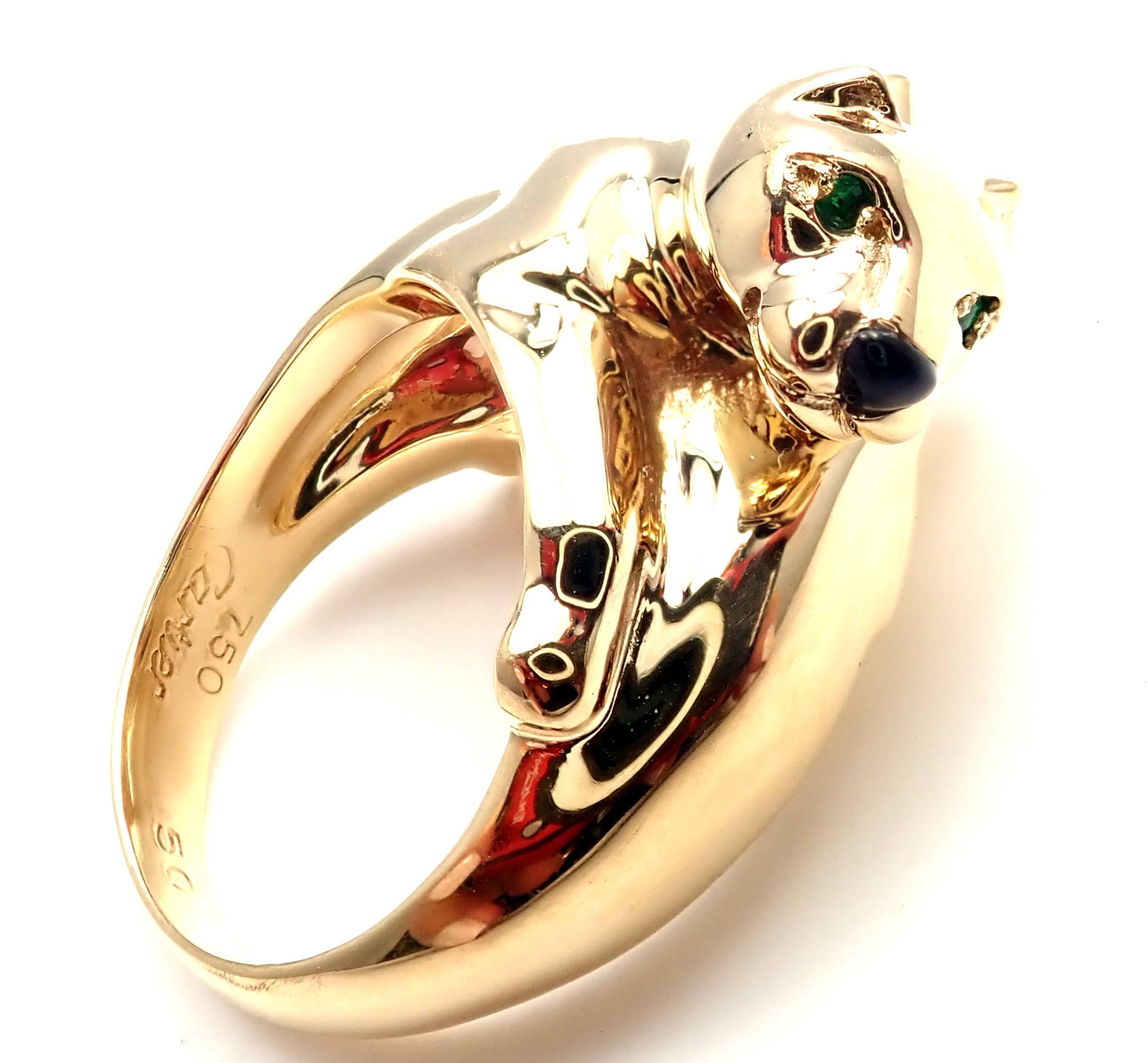 18k Yellow Gold Double Panther Emerald Black Onyx Ring by Cartier
With 4 Emerald Eyes, and 2 Onyx Noses.
This ring comes with original Cartier certificate and Cartier box.
Details:
Ring Size: European 50 US 5 1/4
Width: 13mm
Weight: 14.2