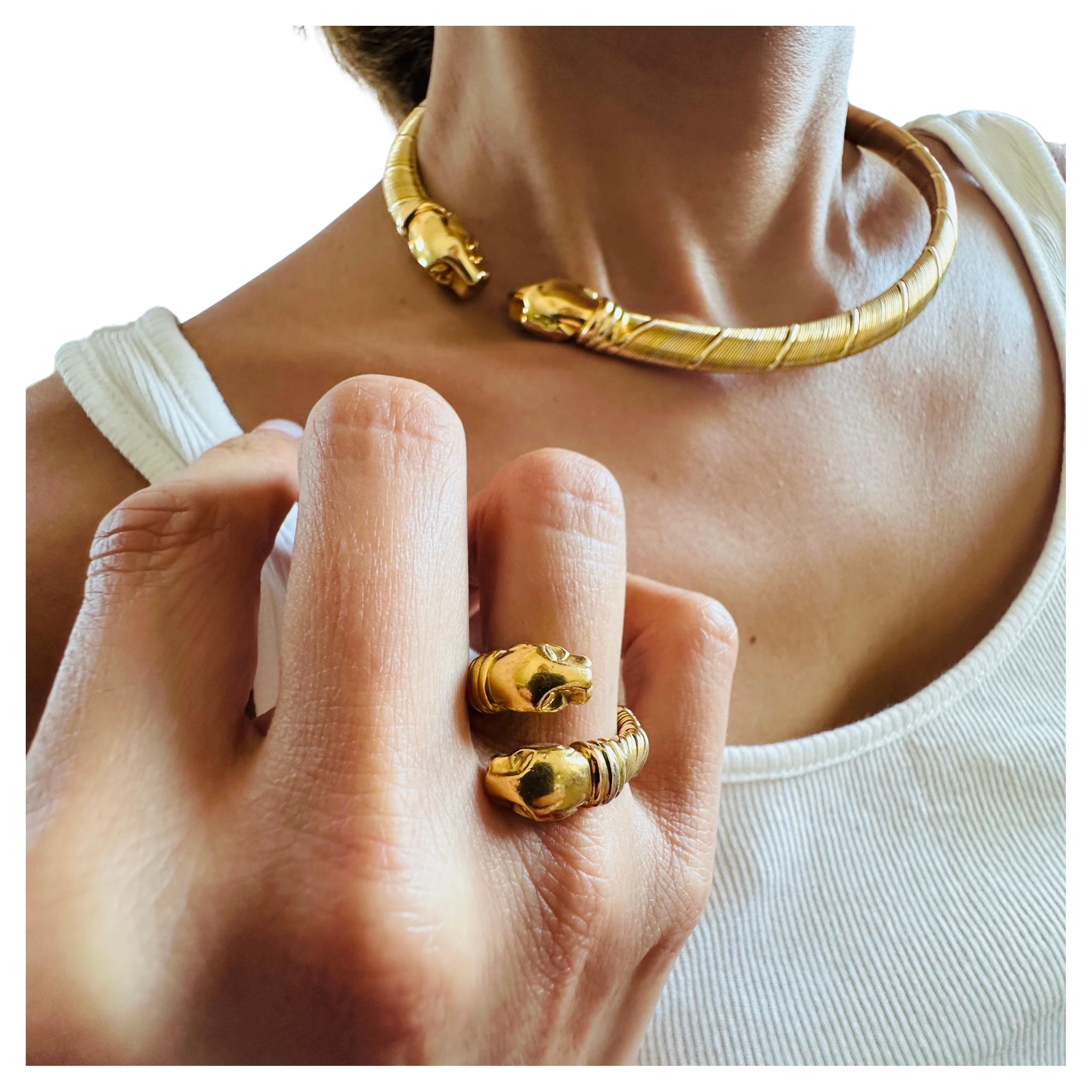 Vintage Cartier Panthère Ring in Three Color 18k Gold Although it looks like Yellow Gold. The Necklace and Bracelet is being sold on my page . The weight of this ring is 12 grams The size is 6 to 6.5 
Signed and Hallmarked with numbers 