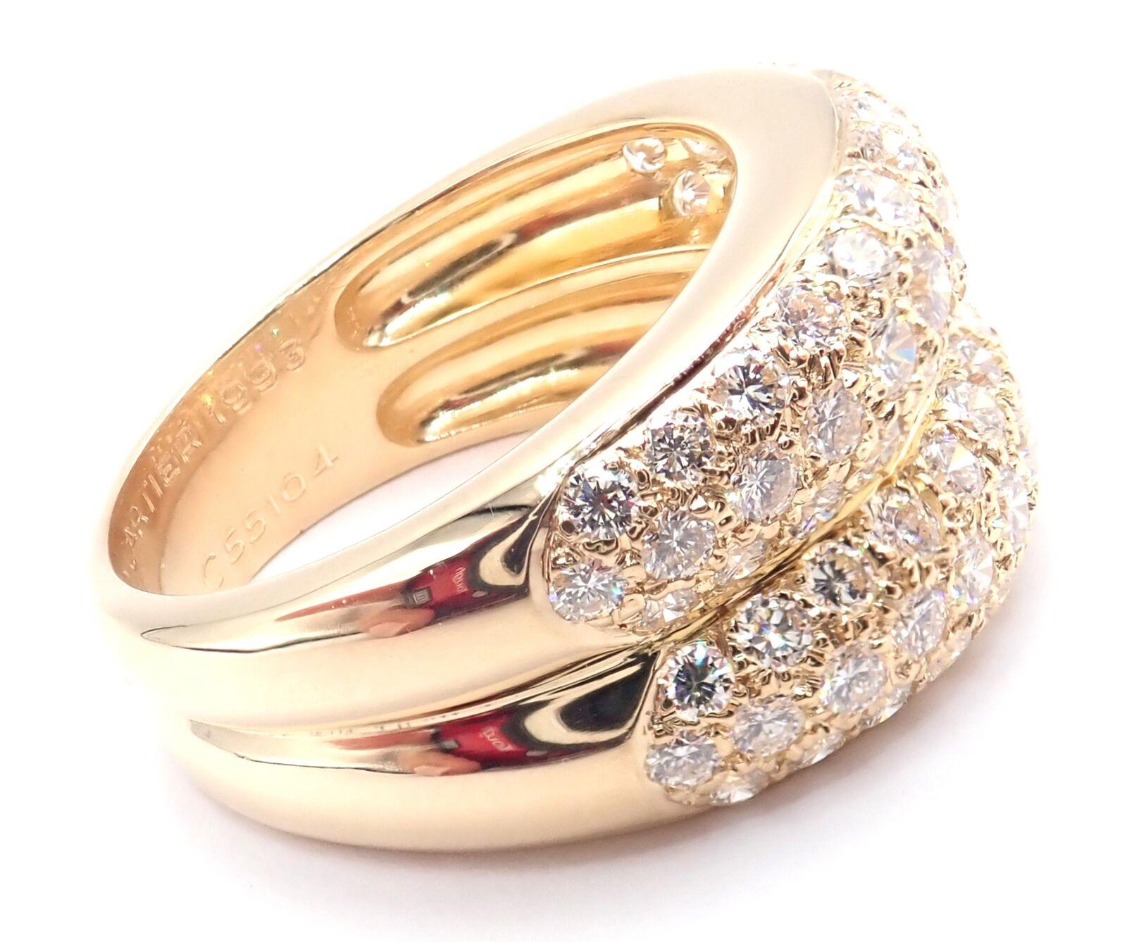 18k Yellow Gold Double Pave Diamond Band Ring by Cartier.
With 60 round brilliant cut diamonds VS1 clarity, E color total weight approximately 2.50ctw
Measurements:
Weight: 8.5 grams
Width: 12mm
Ring Size: European 55, US 7.25
Stamped Hallmarks: