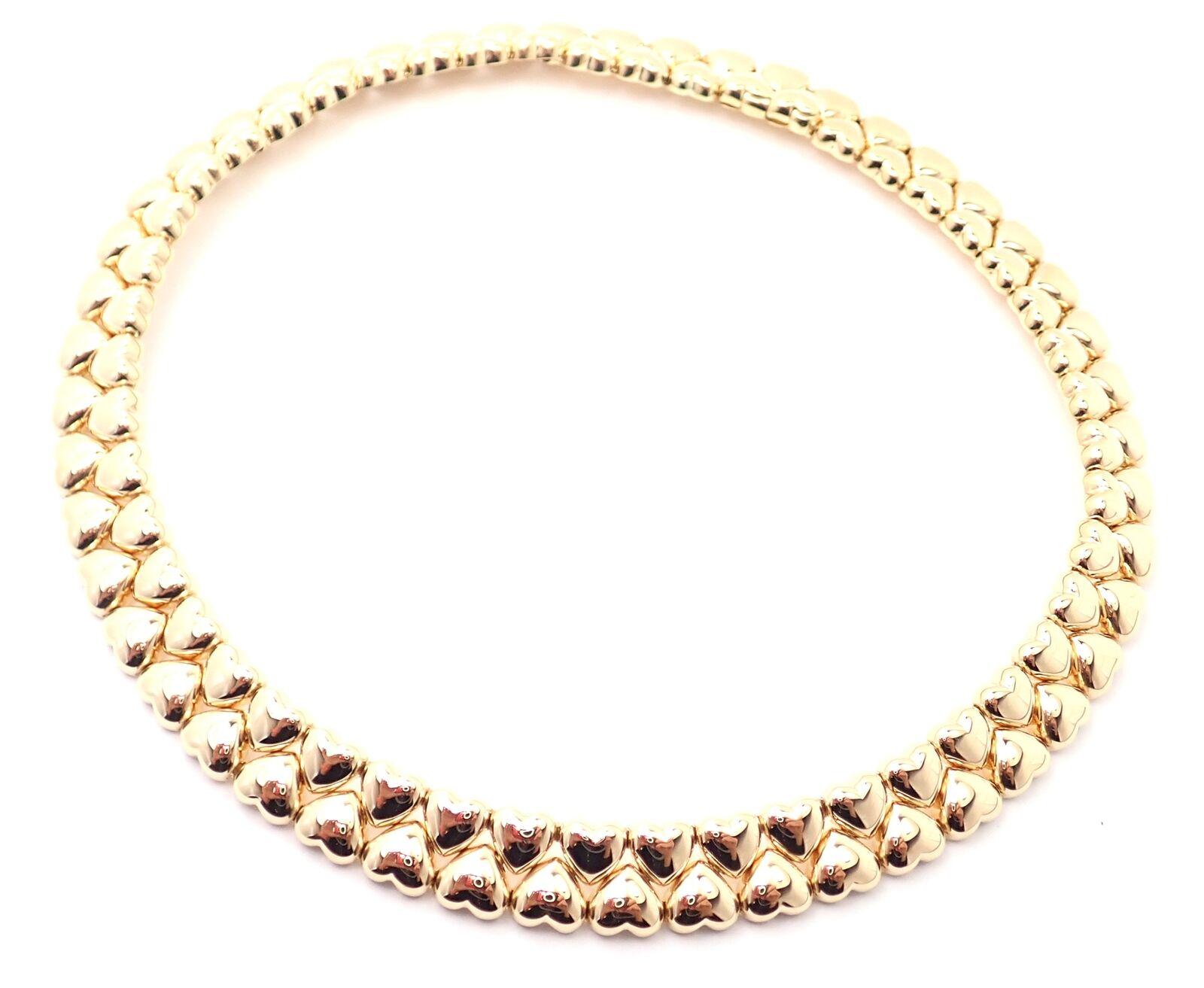 18k Yellow Gold Double Row Heart Choker Necklace by Cartier. 
Details: 
Weight: 87.2 grams
Length: 16